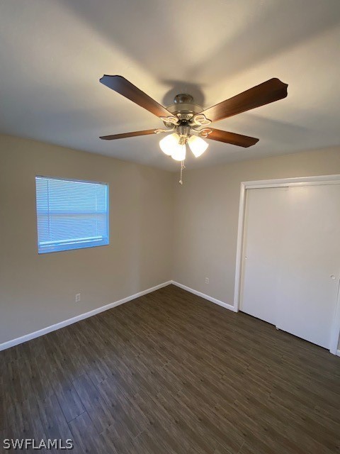 18688 Sebring Road Fort Myers, FL 33967 - Photo 8 of 20 a view of an empty room with wooden floor