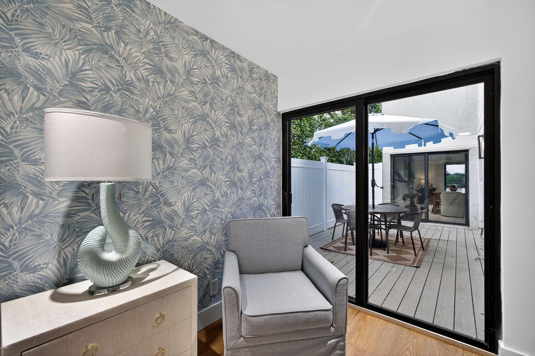 6550 North Ocean Boulevard, Unit 1 Ocean Ridge, FL 33435 - Photo 20 of 63 a living room with furniture and a floor to ceiling window