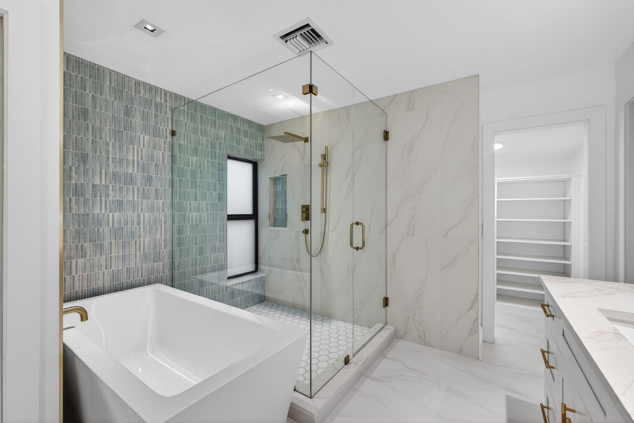 6550 North Ocean Boulevard, Unit 1 Ocean Ridge, FL 33435 - Photo 26 of 63 a bathroom with a sink a toilet and shower