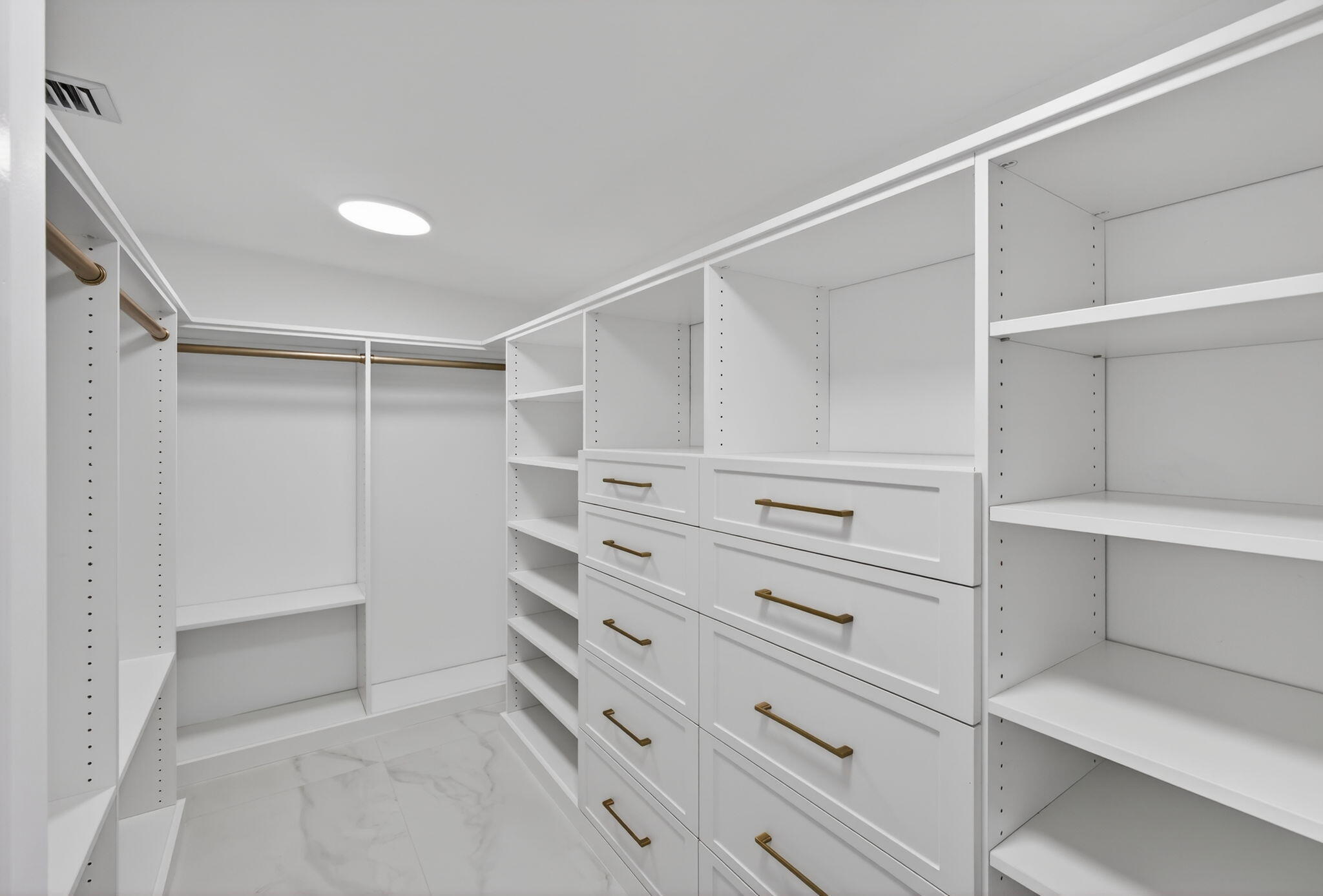 6550 North Ocean Boulevard, Unit 1 Ocean Ridge, FL 33435 - Photo 29 of 63 a view of walk in closet with empty racks