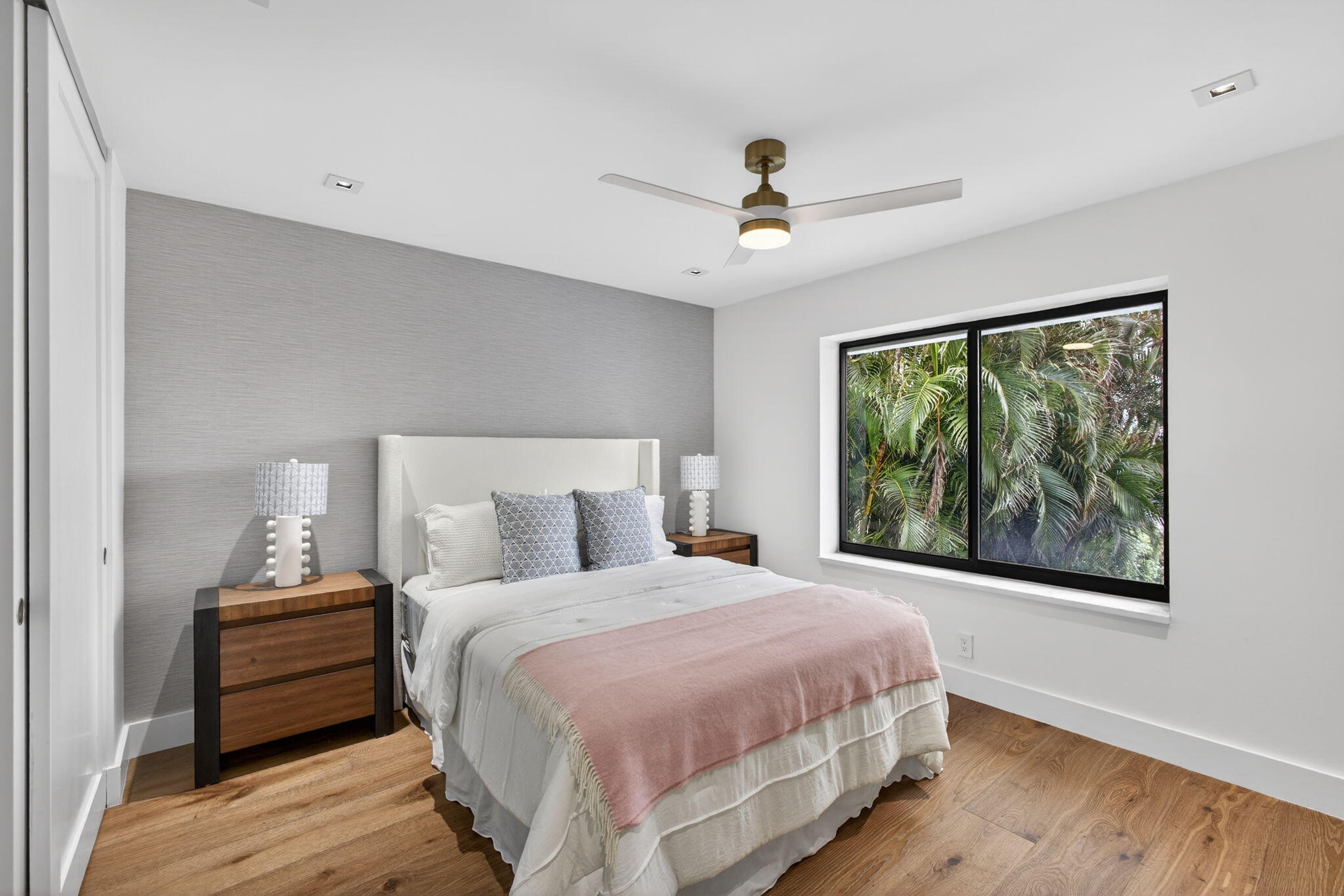 6550 North Ocean Boulevard, Unit 1 Ocean Ridge, FL 33435 - Photo 35 of 63 a bedroom with a large bed and a large window