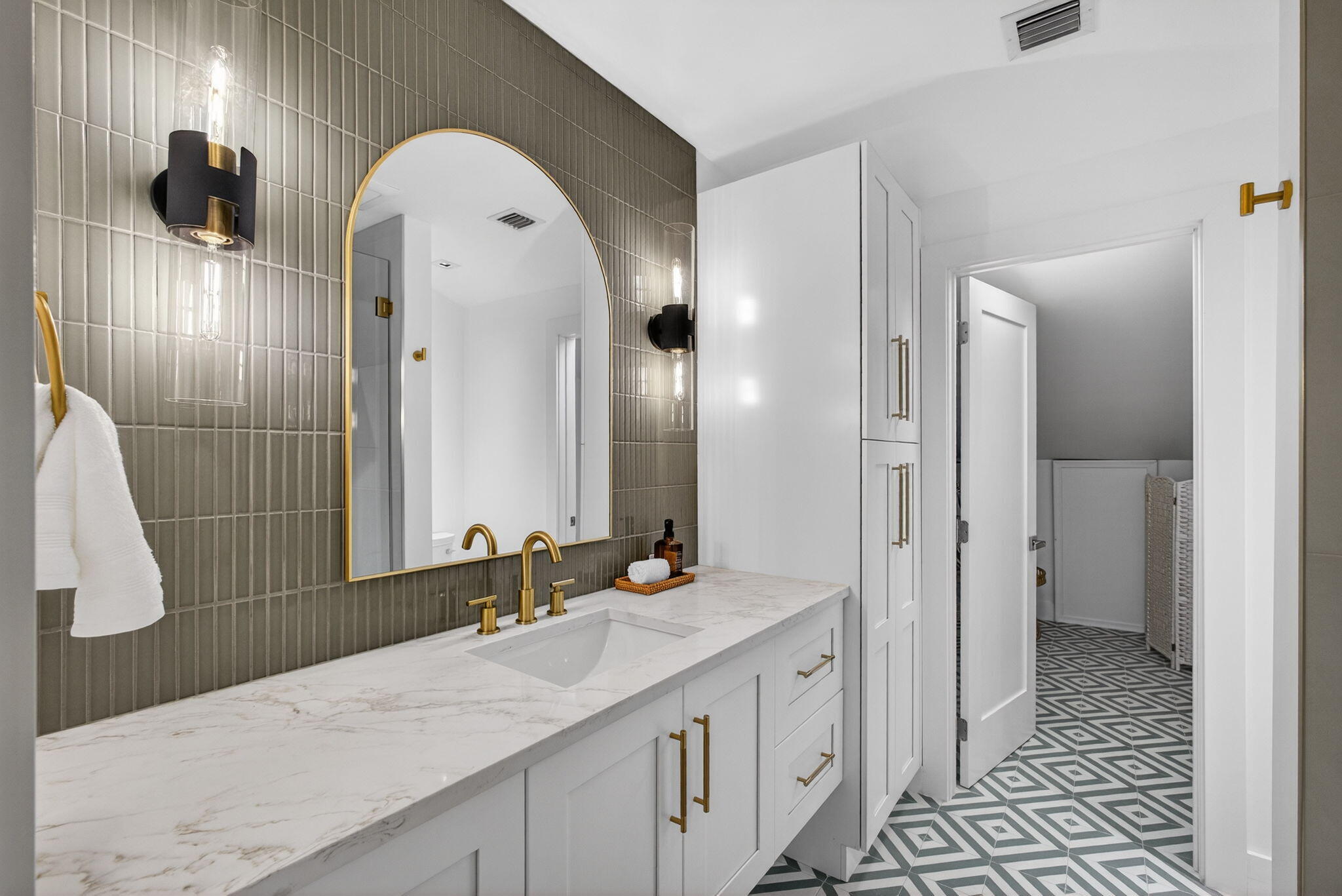 6550 North Ocean Boulevard, Unit 1 Ocean Ridge, FL 33435 - Photo 40 of 63 a spacious bathroom with a double vanity sink and a mirror