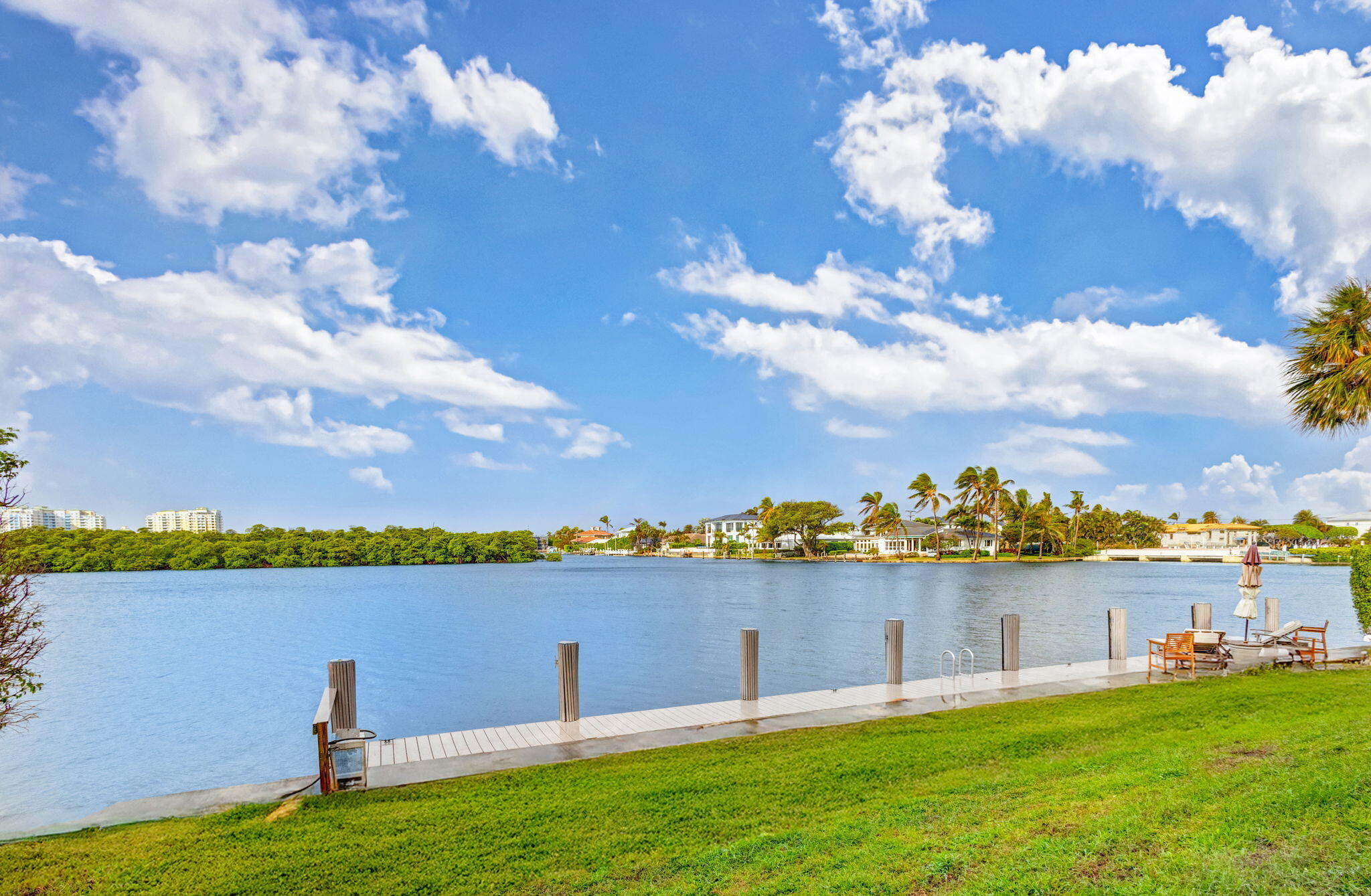 6550 North Ocean Boulevard, Unit 1 Ocean Ridge, FL 33435 - Photo 55 of 63 a view of a lake with houses in the back