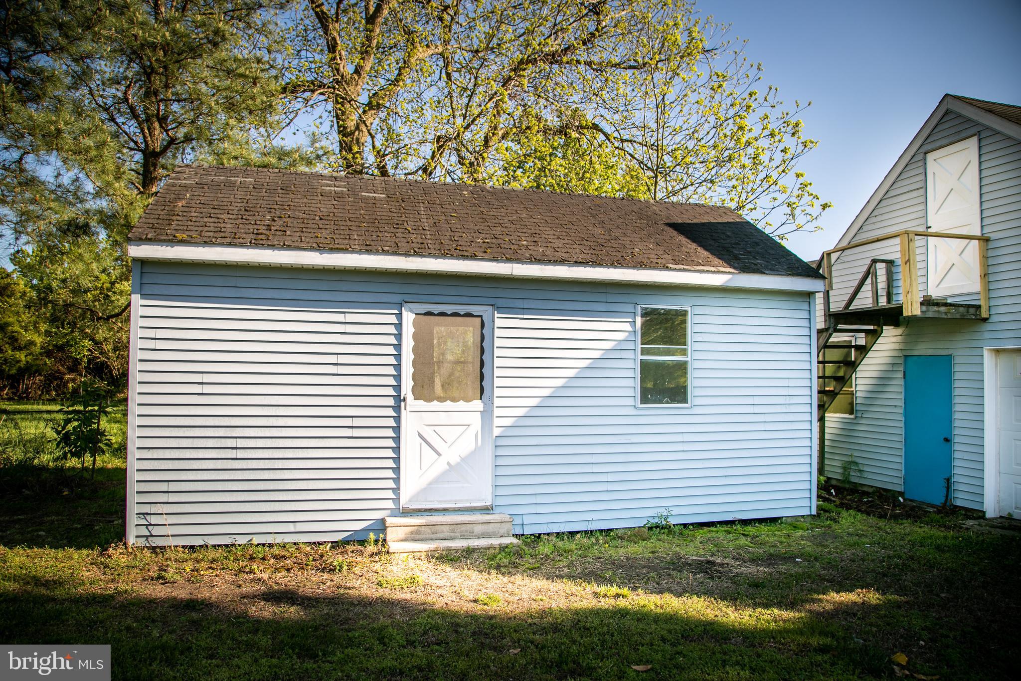 20135 Nanticoke Road Nanticoke, MD 21840 - Photo 46 of 47 a view of a house with a yard
