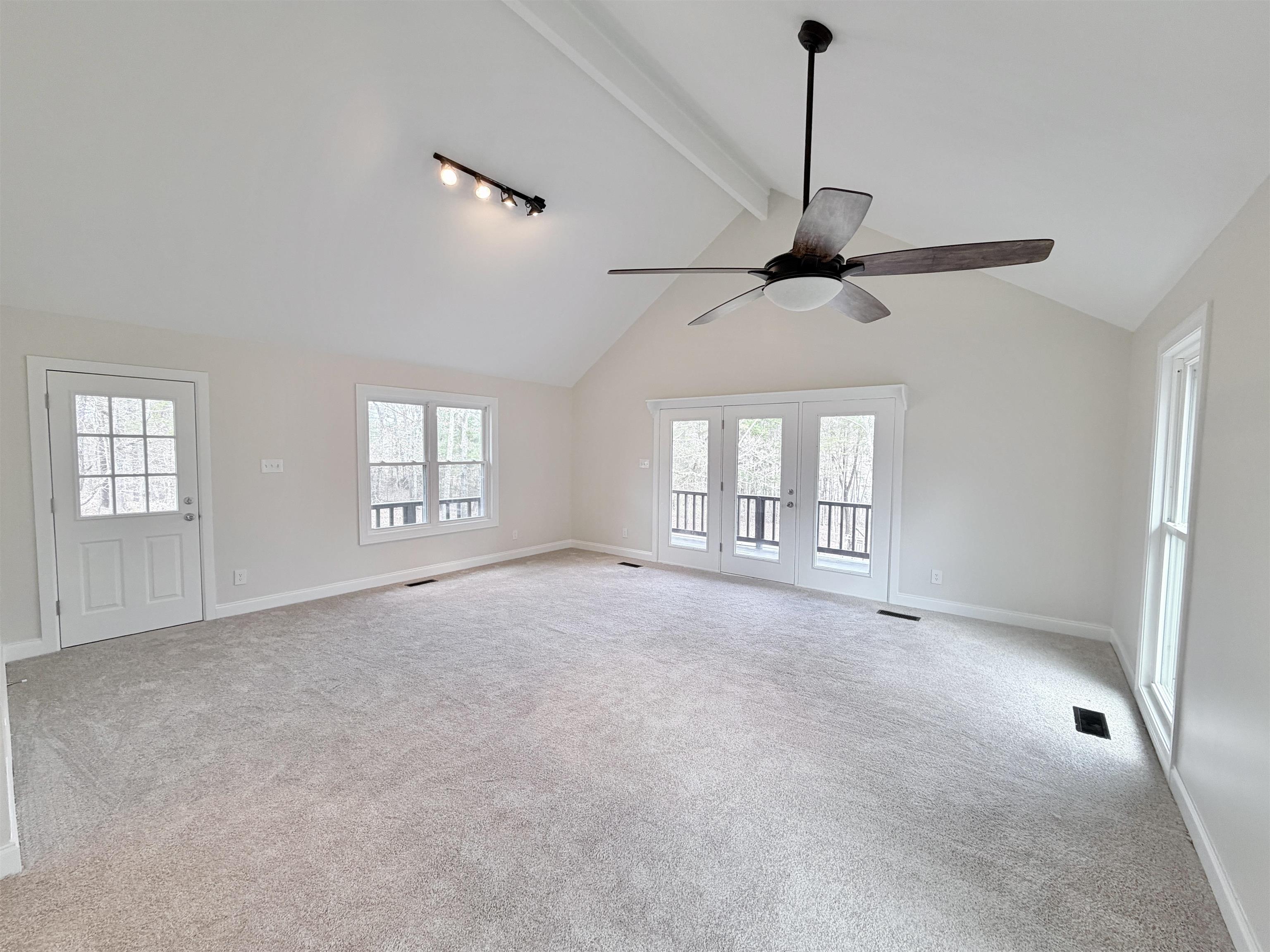 955 Country Club Road Somerville, TN 38068 - Photo 19 of 40 Empty room with light carpet and ceiling fan