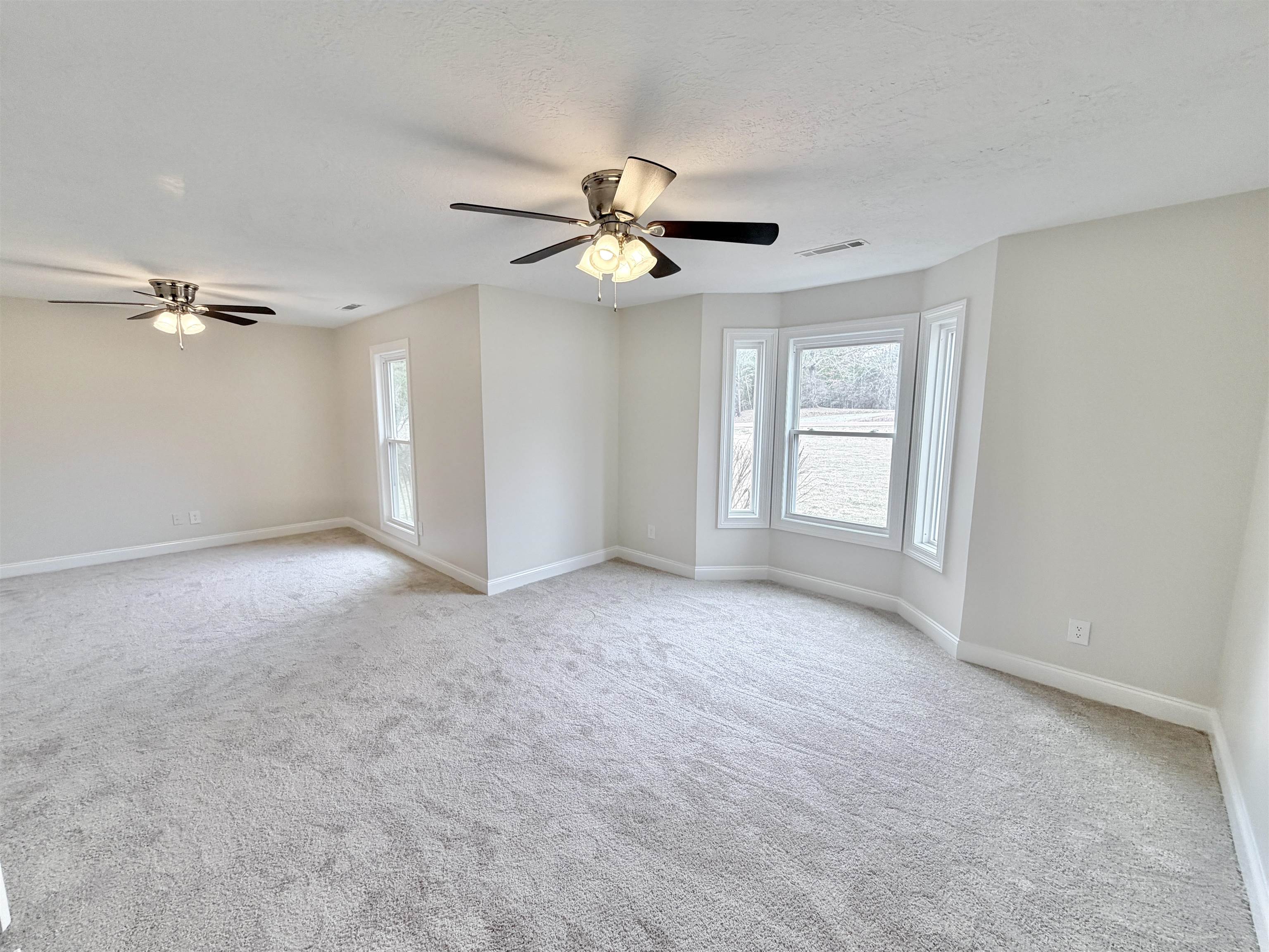 955 Country Club Road Somerville, TN 38068 - Photo 24 of 40 a view of an empty room with a window