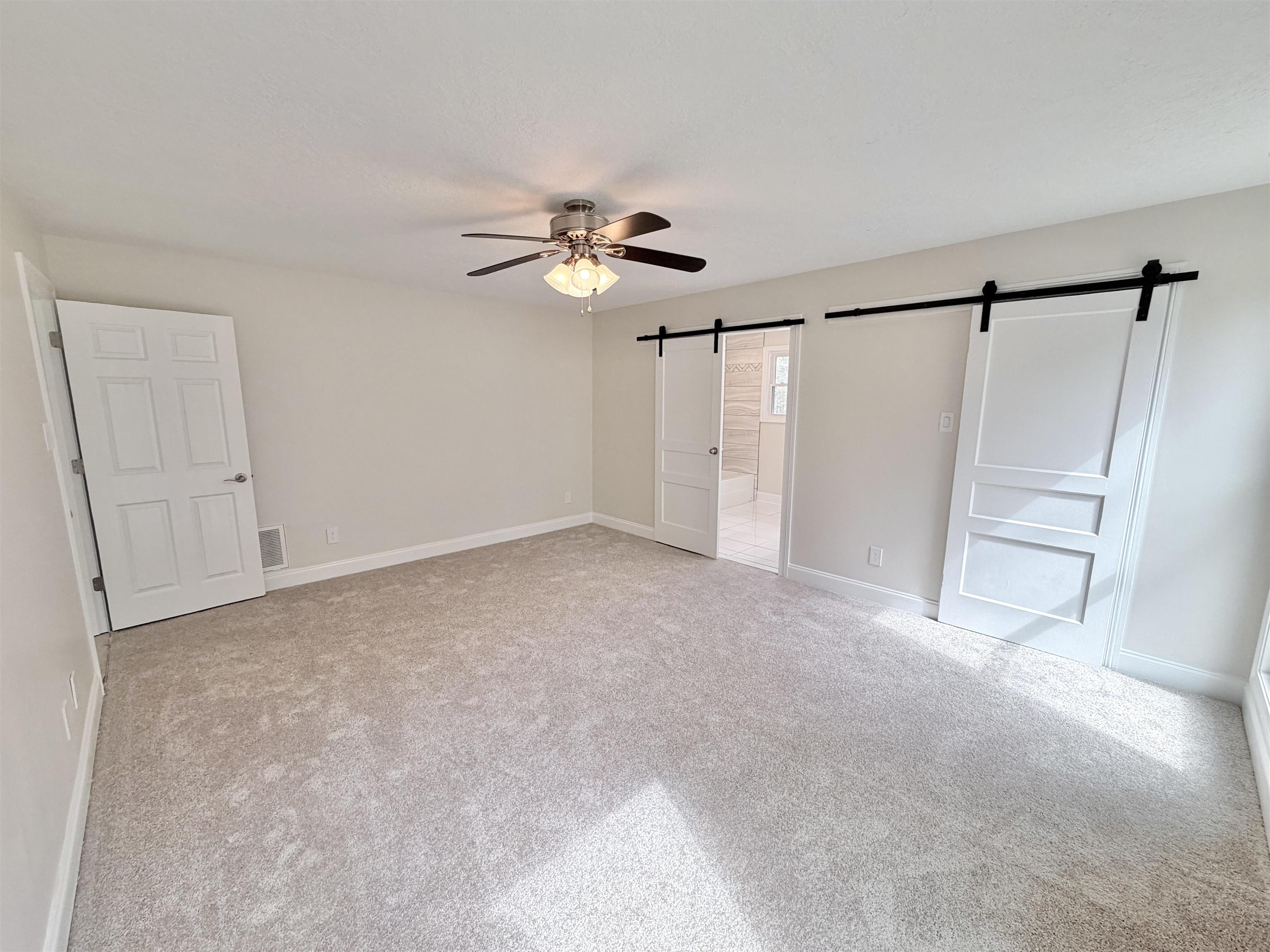 955 Country Club Road Somerville, TN 38068 - Photo 25 of 40 a view of an empty room