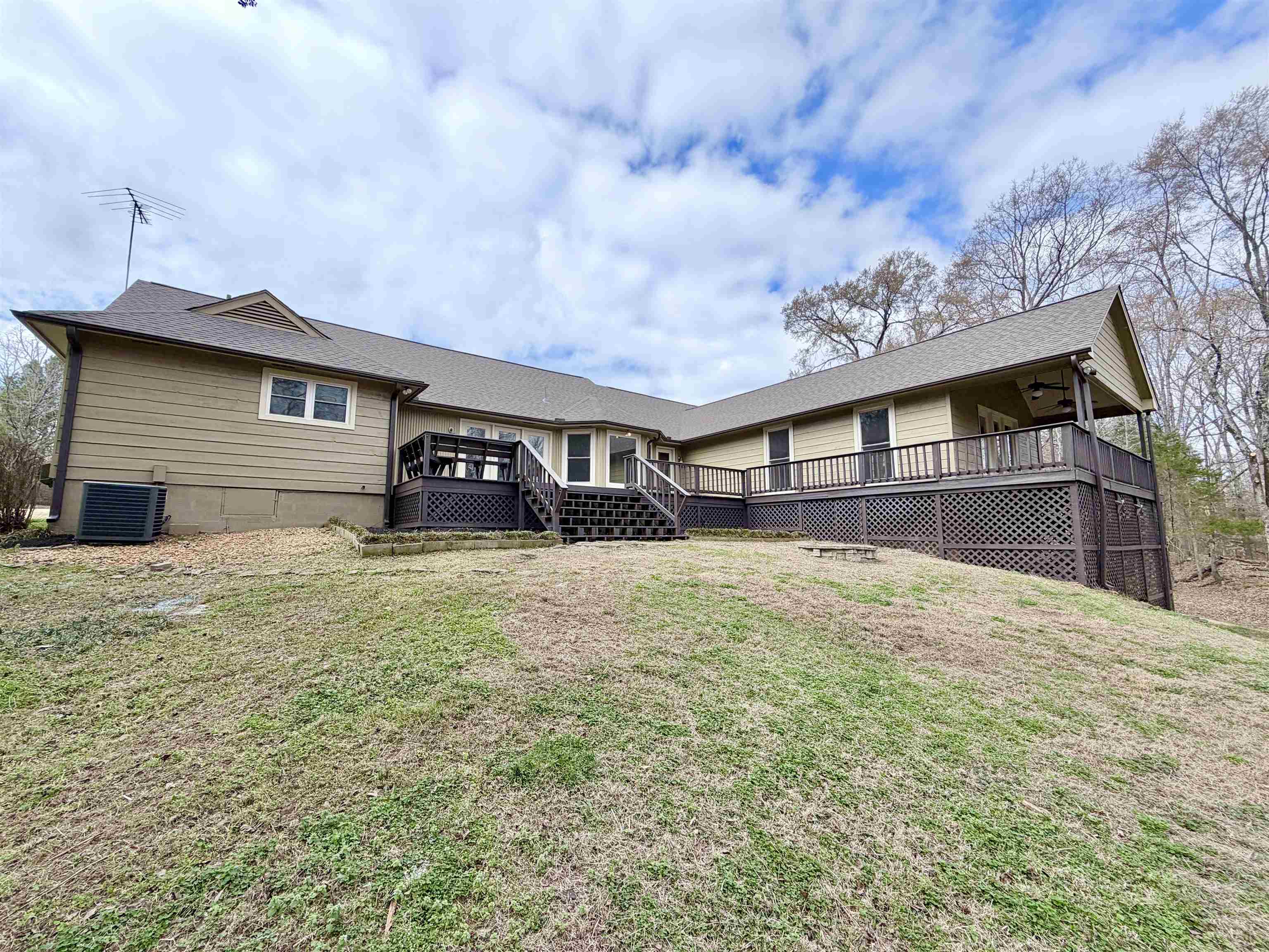 955 Country Club Road Somerville, TN 38068 - Photo 38 of 40 Rear view of house featuring a wooden deck, a yard, and a ceiling fan