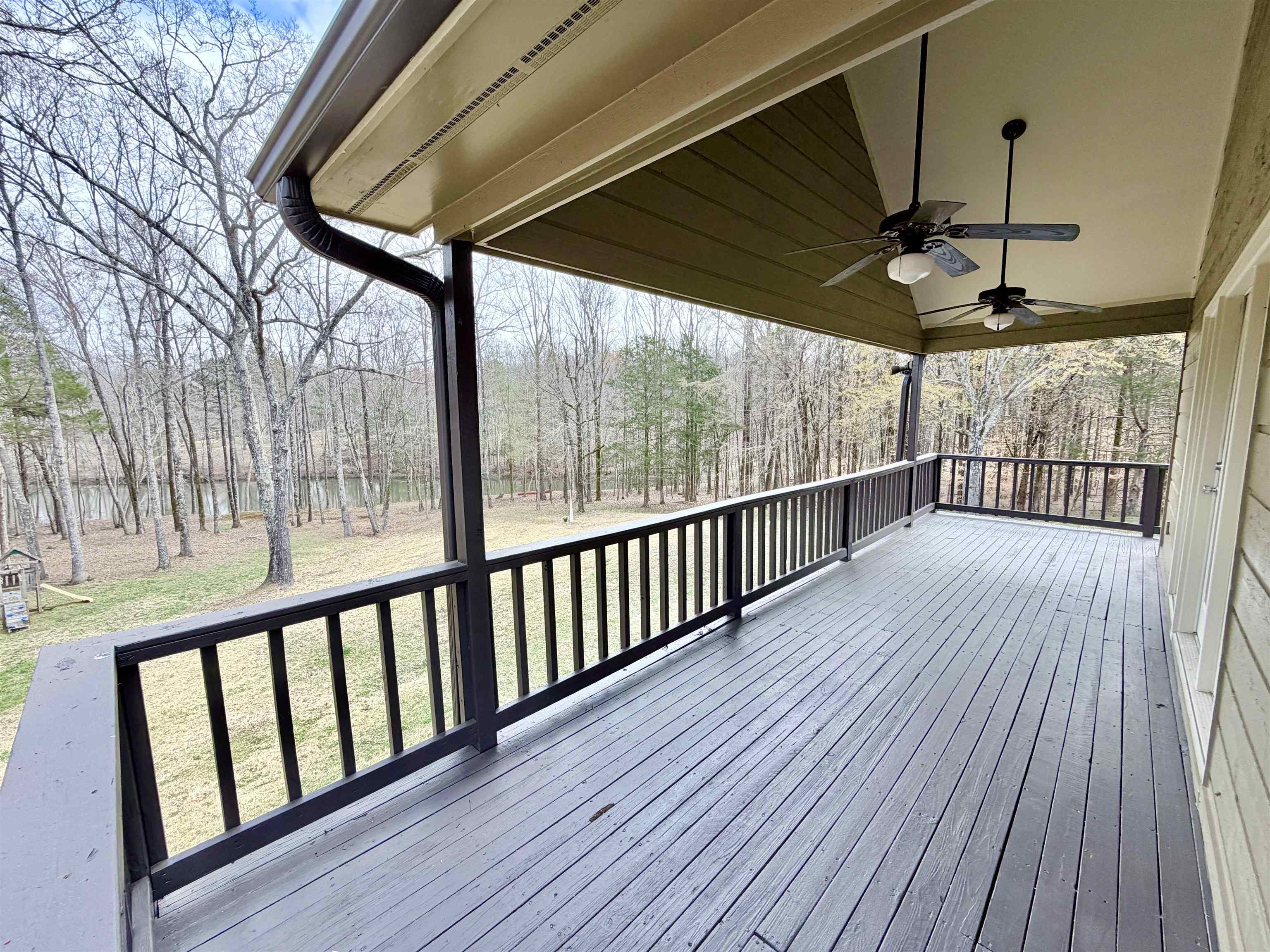 955 Country Club Road Somerville, TN 38068 - Photo 4 of 40 a view of a porch with wooden floor and outdoor space