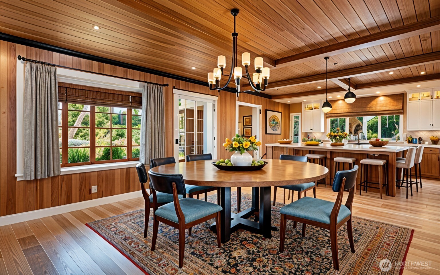23606 Tiger Mountain Road Southeast Issaquah, WA 98027 - Photo 17 of 39 a view of a dining room with furniture window and wooden floor