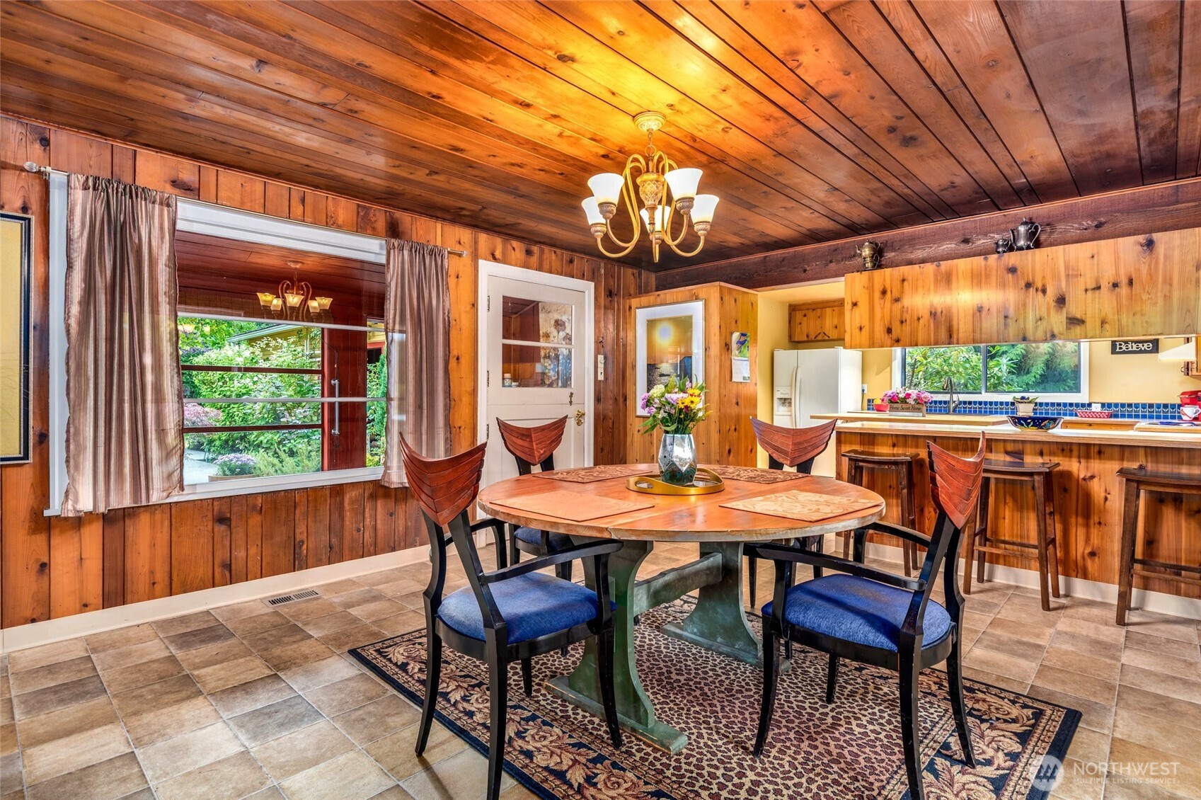 23606 Tiger Mountain Road Southeast Issaquah, WA 98027 - Photo 18 of 39 a outdoor dining space with furniture and window