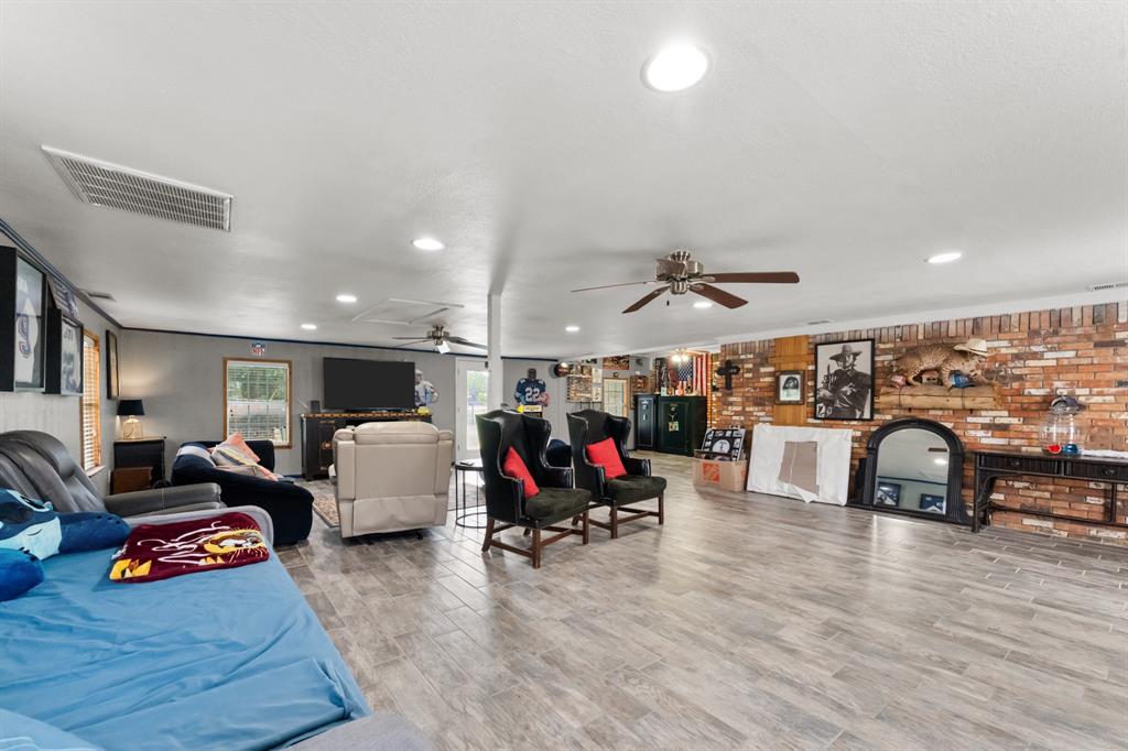 380 Farr Altom Road Seagoville, TX 75159 - Photo 15 of 30 Spacious common area featuring wood-finish flooring, recessed lighting, and a ceiling fan