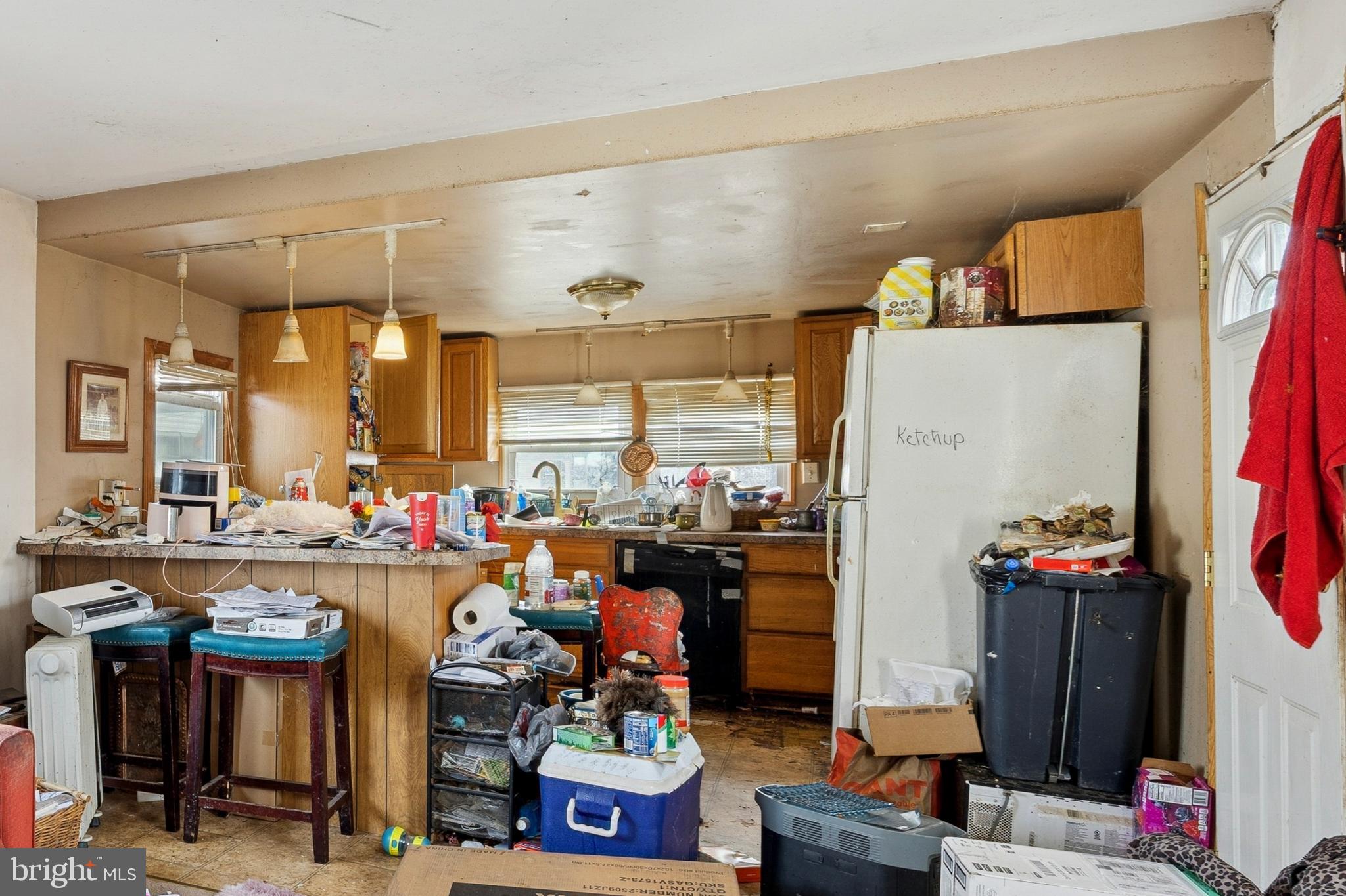 165 West Ridge Pike, Unit 215 Limerick, PA 19468 - Photo 4 of 8 a room with furniture and a flat screen tv
