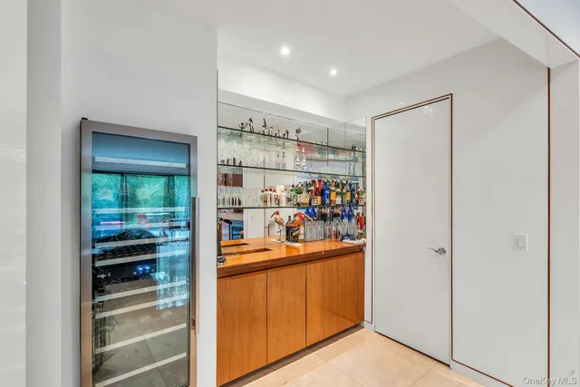 a backyard of a house with outdoor seating