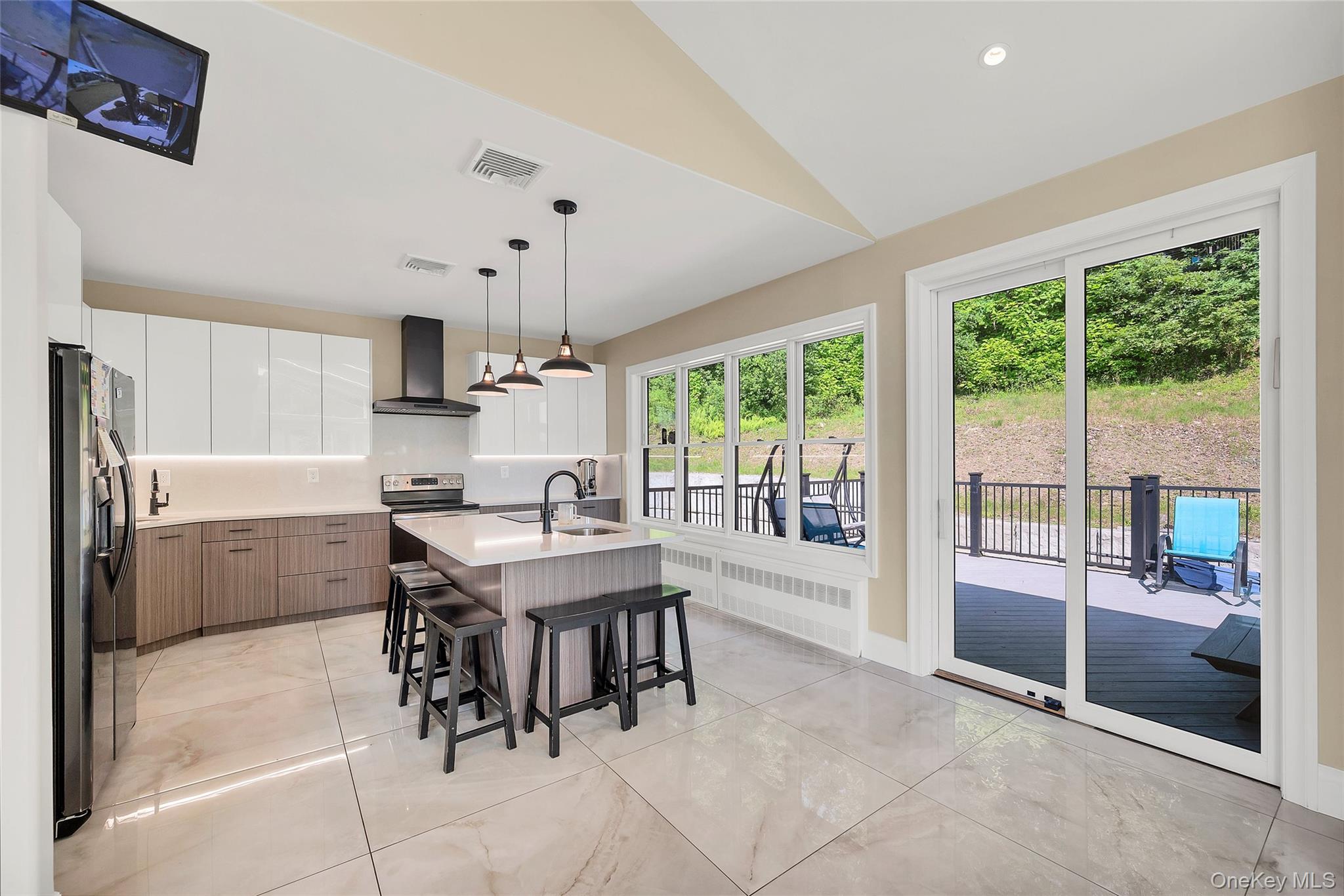 31 Walnut Ridge Lane Bloomingburg, NY 12721 - Photo 13 of 50 a view of a kitchen with dining table and chairs