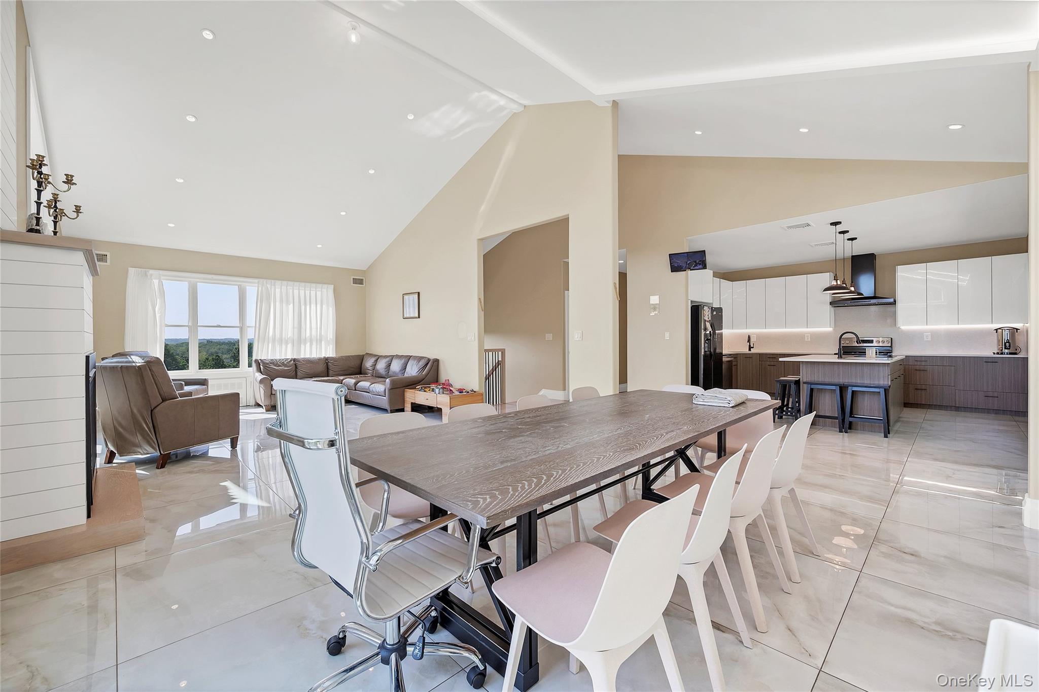 31 Walnut Ridge Lane Bloomingburg, NY 12721 - Photo 14 of 50 a view of a dining room with furniture and a kitchen