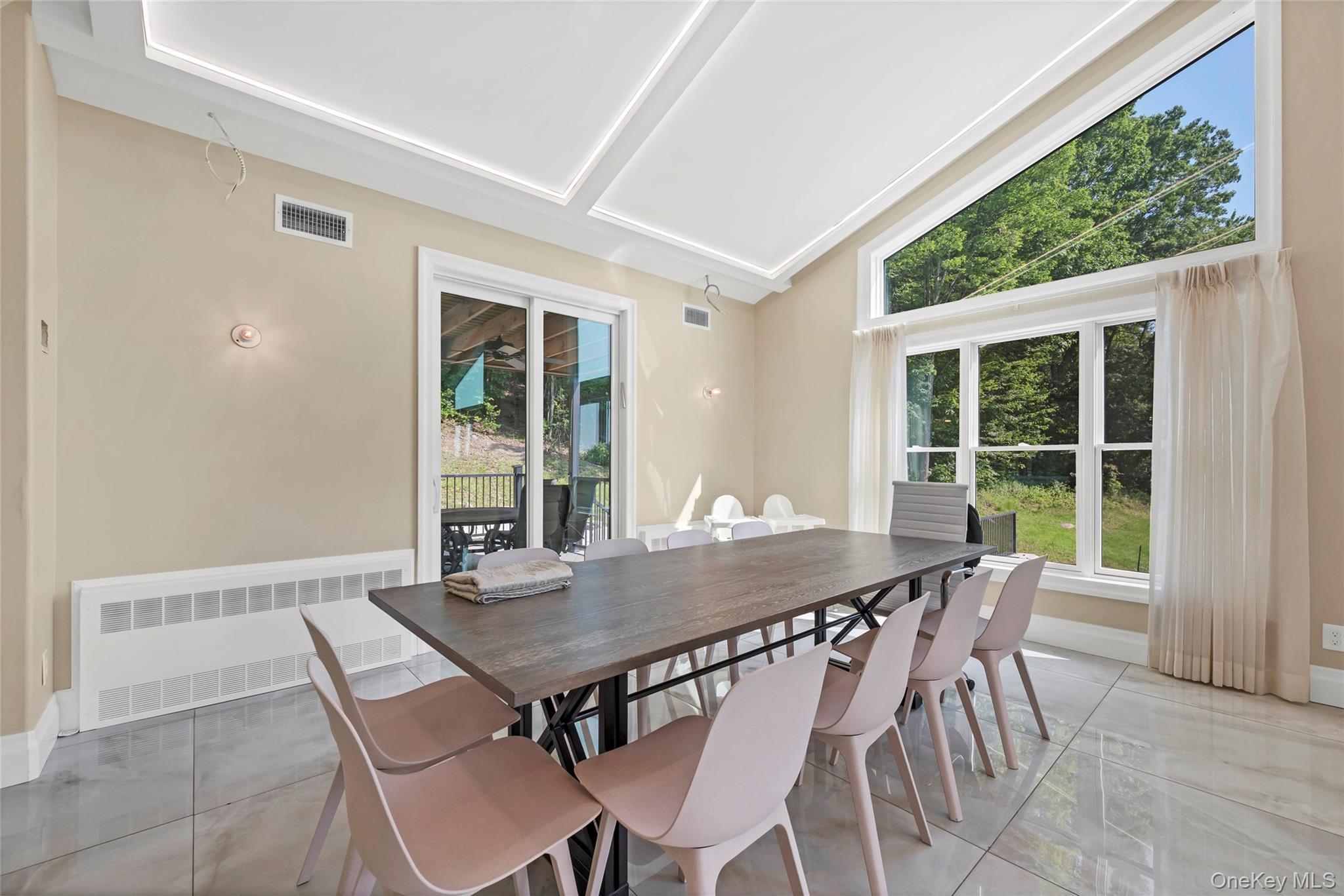31 Walnut Ridge Lane Bloomingburg, NY 12721 - Photo 15 of 50 a view of a dining table and chairs in roof deck