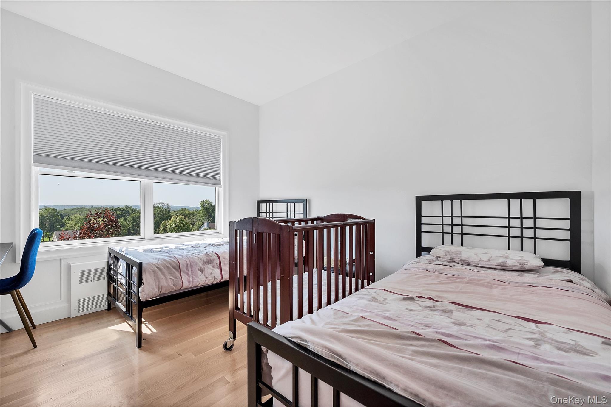 31 Walnut Ridge Lane Bloomingburg, NY 12721 - Photo 17 of 50 a bedroom with a bed and wooden floor