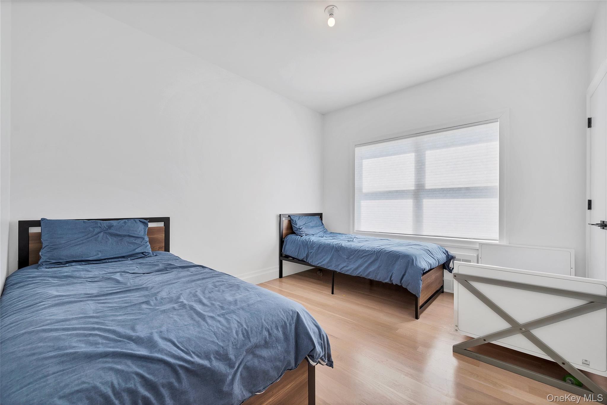 31 Walnut Ridge Lane Bloomingburg, NY 12721 - Photo 18 of 50 a bedroom with a bed and window