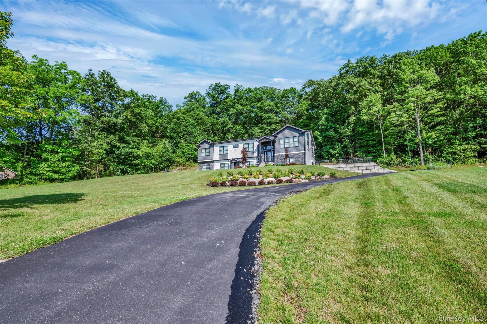 31 Walnut Ridge Lane Bloomingburg, NY 12721 - Photo 2 of 50 a view of a swimming pool with a yard