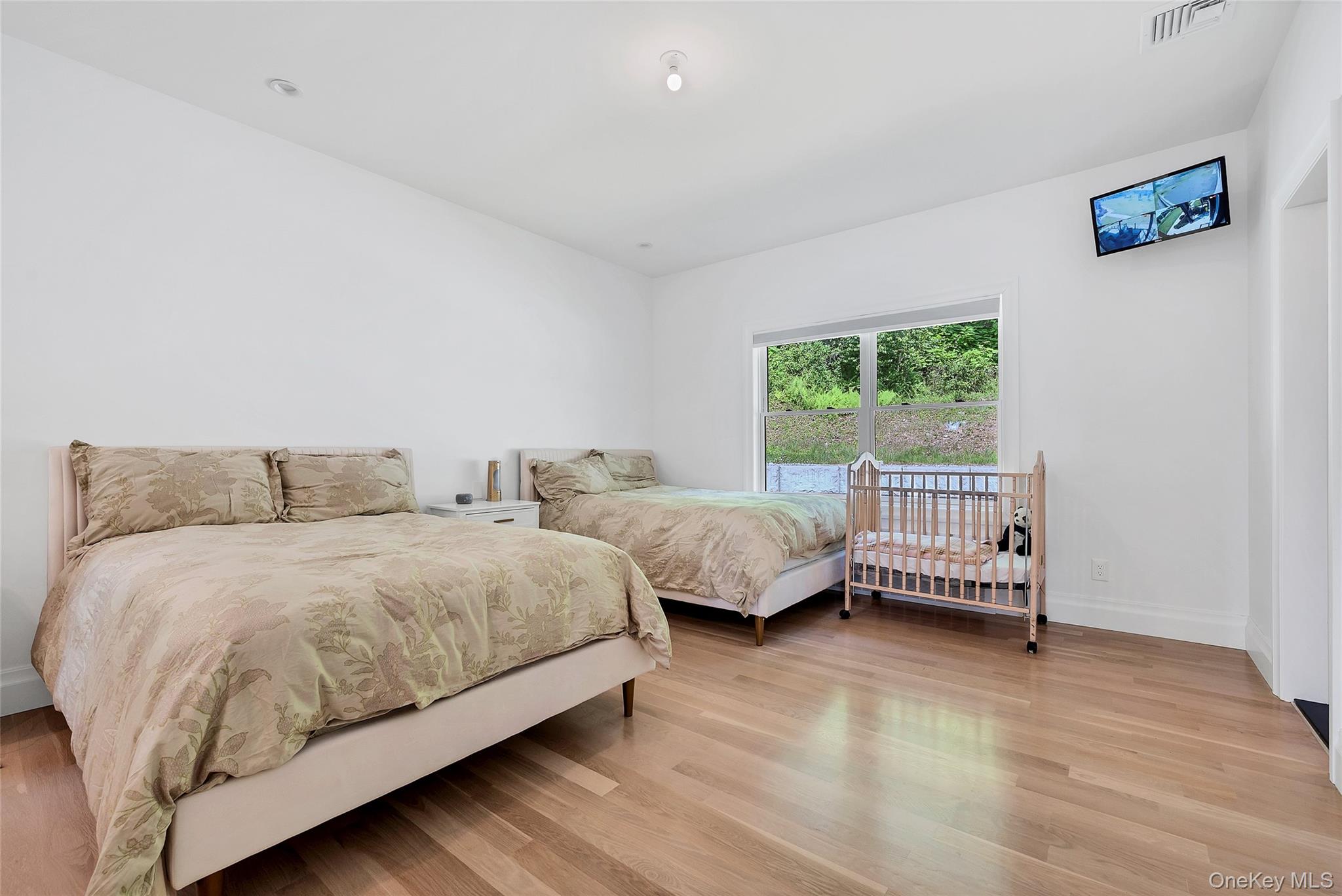 31 Walnut Ridge Lane Bloomingburg, NY 12721 - Photo 23 of 50 a room with a bed and a window