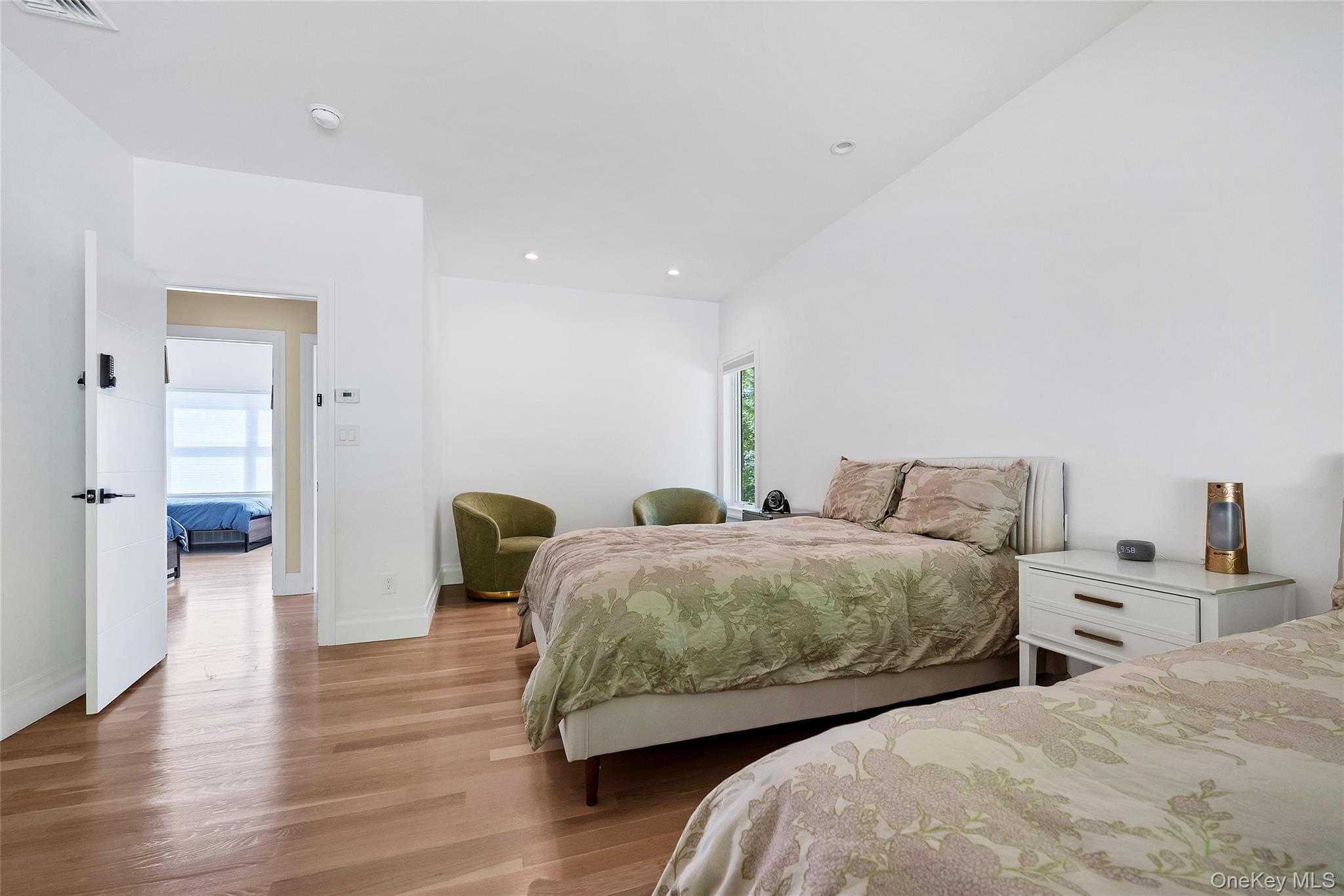 31 Walnut Ridge Lane Bloomingburg, NY 12721 - Photo 24 of 50 a bedroom with two beds and a lamp