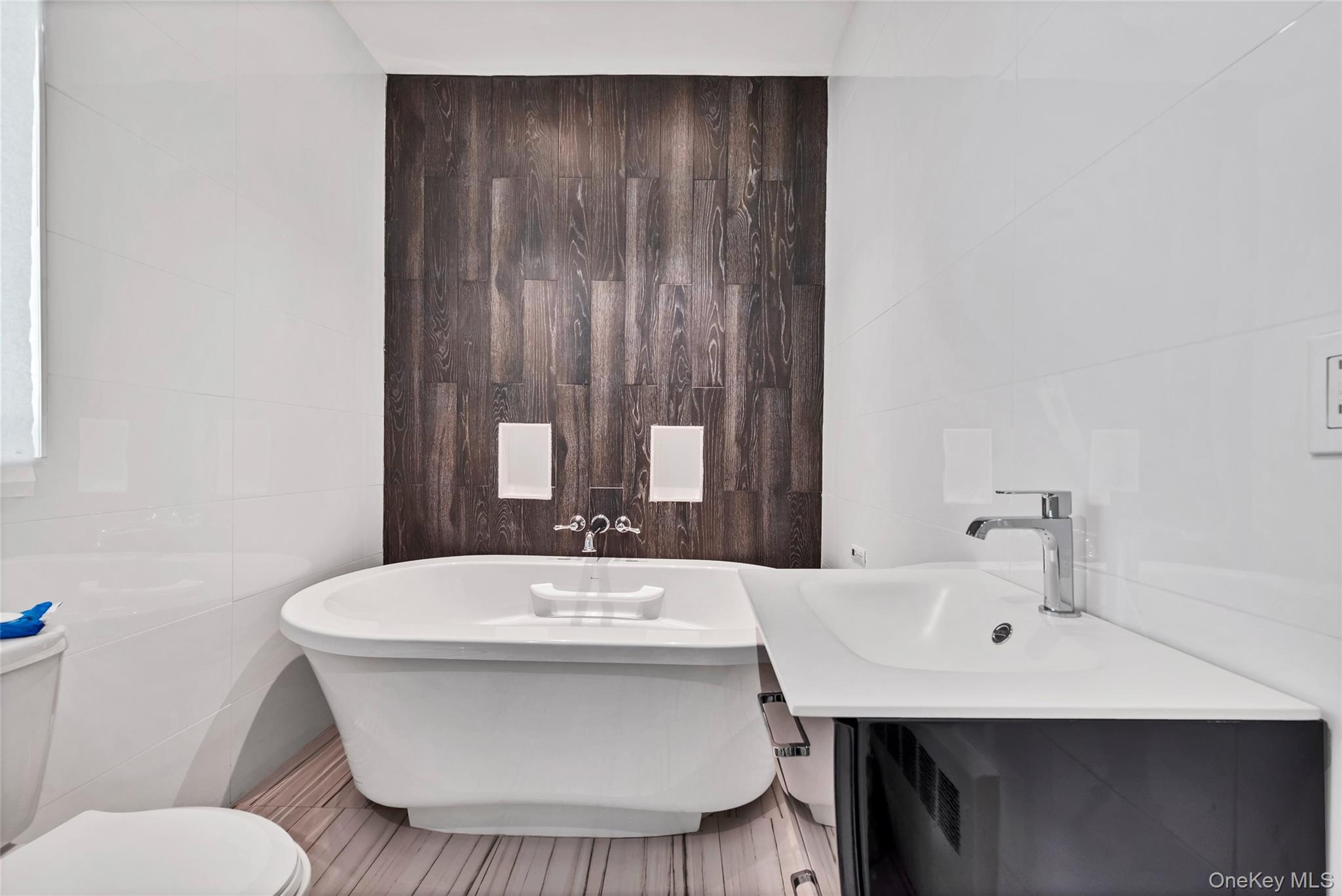 31 Walnut Ridge Lane Bloomingburg, NY 12721 - Photo 28 of 50 a bathroom with a sink and a mirror