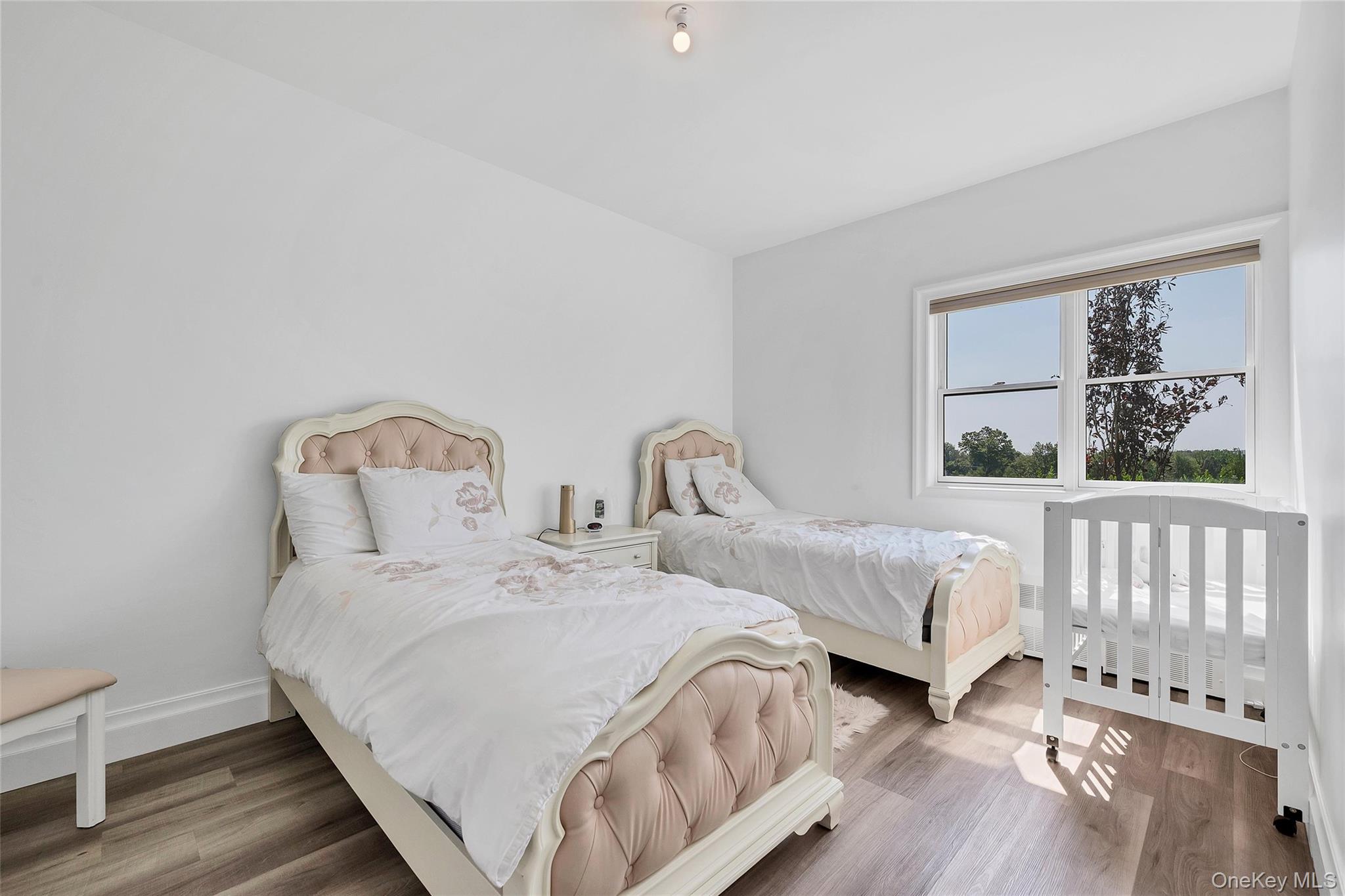 31 Walnut Ridge Lane Bloomingburg, NY 12721 - Photo 30 of 50 a bedroom with two beds and a window