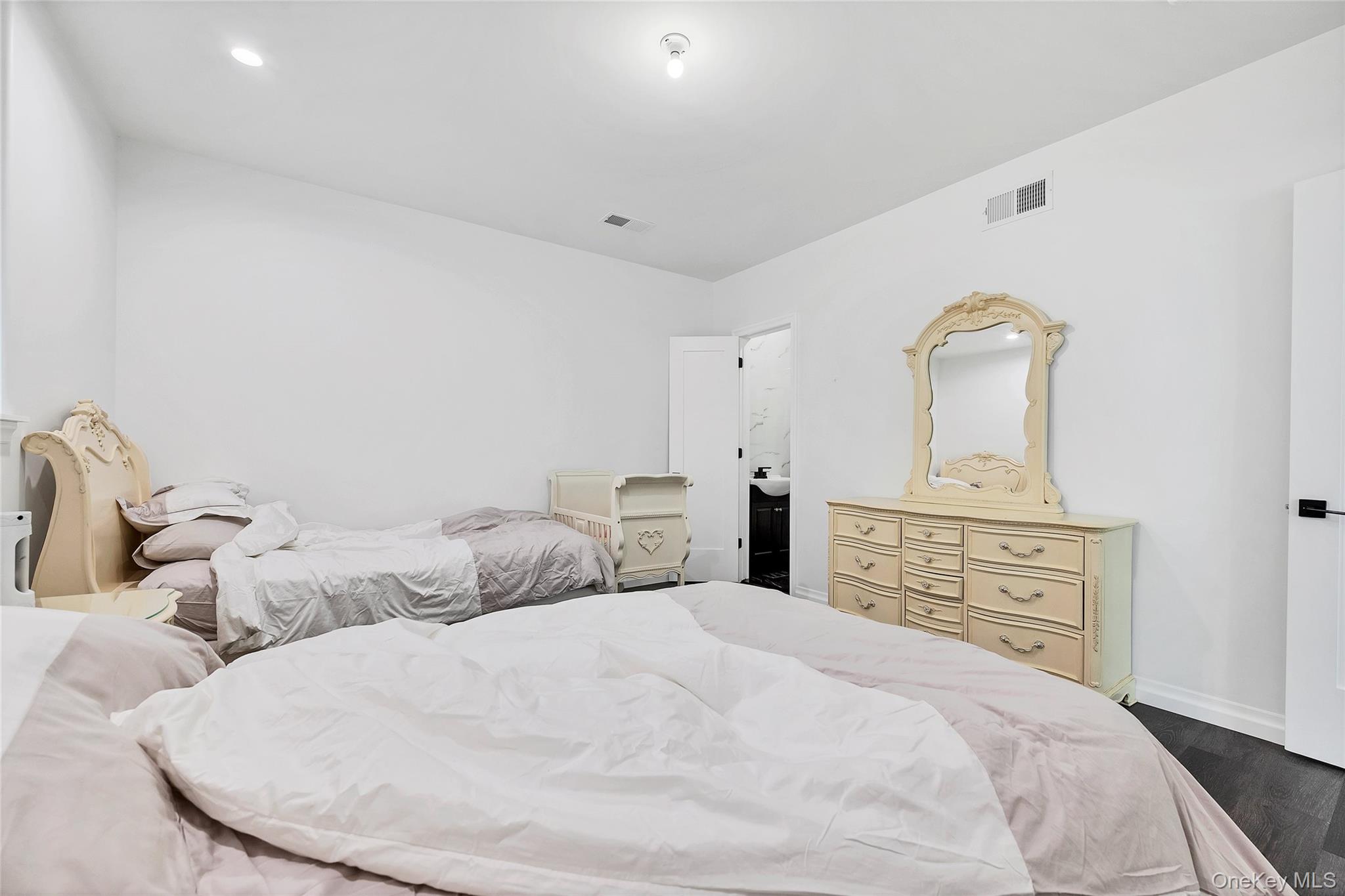 31 Walnut Ridge Lane Bloomingburg, NY 12721 - Photo 41 of 50 a bedroom with a bed and a dresser