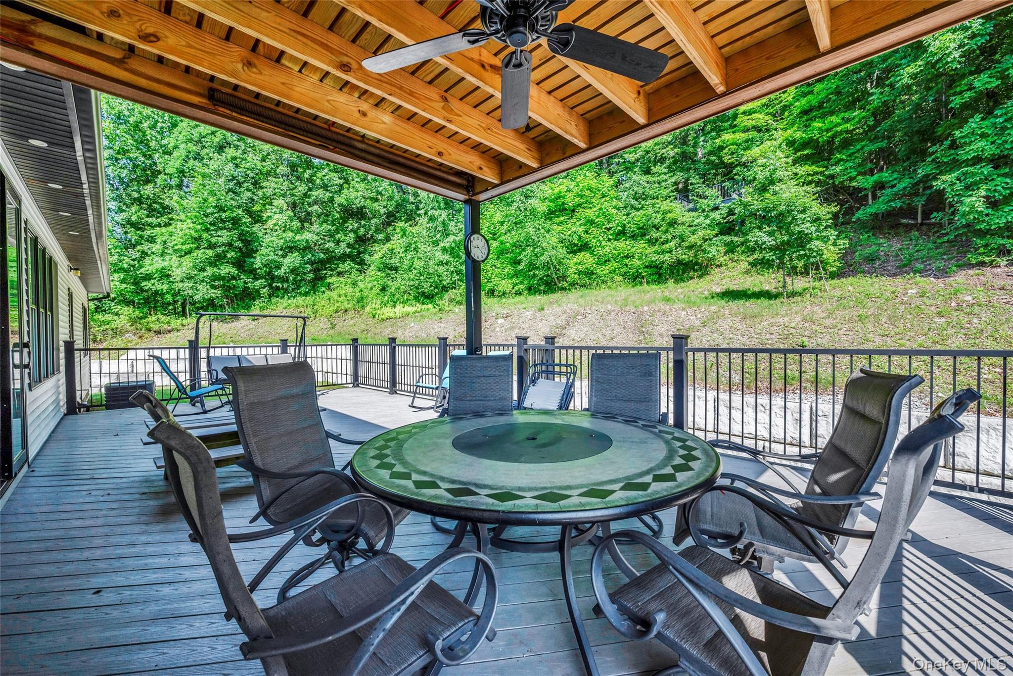 31 Walnut Ridge Lane Bloomingburg, NY 12721 - Photo 48 of 50 a view of a chairs and table in the patio