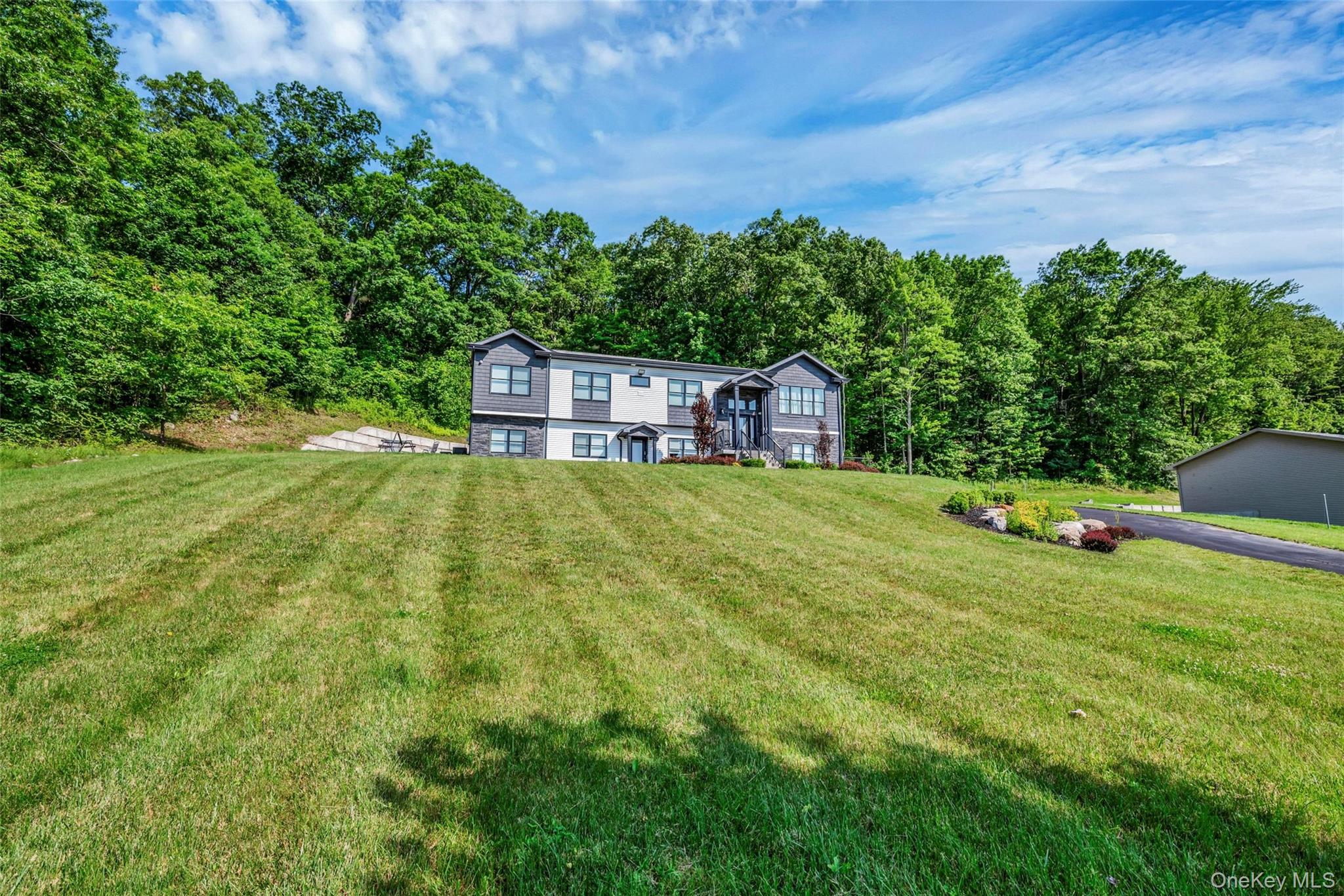 31 Walnut Ridge Lane Bloomingburg, NY 12721 - Photo 50 of 50 a view of a house with a big yard