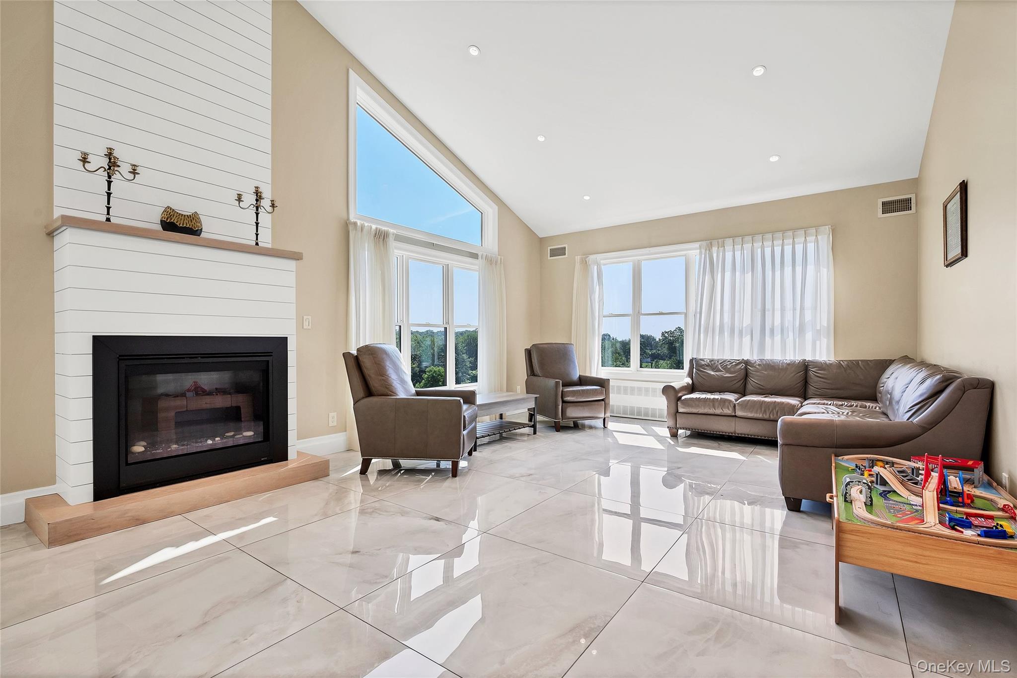31 Walnut Ridge Lane Bloomingburg, NY 12721 - Photo 5 of 50 a living room with furniture and a fireplace