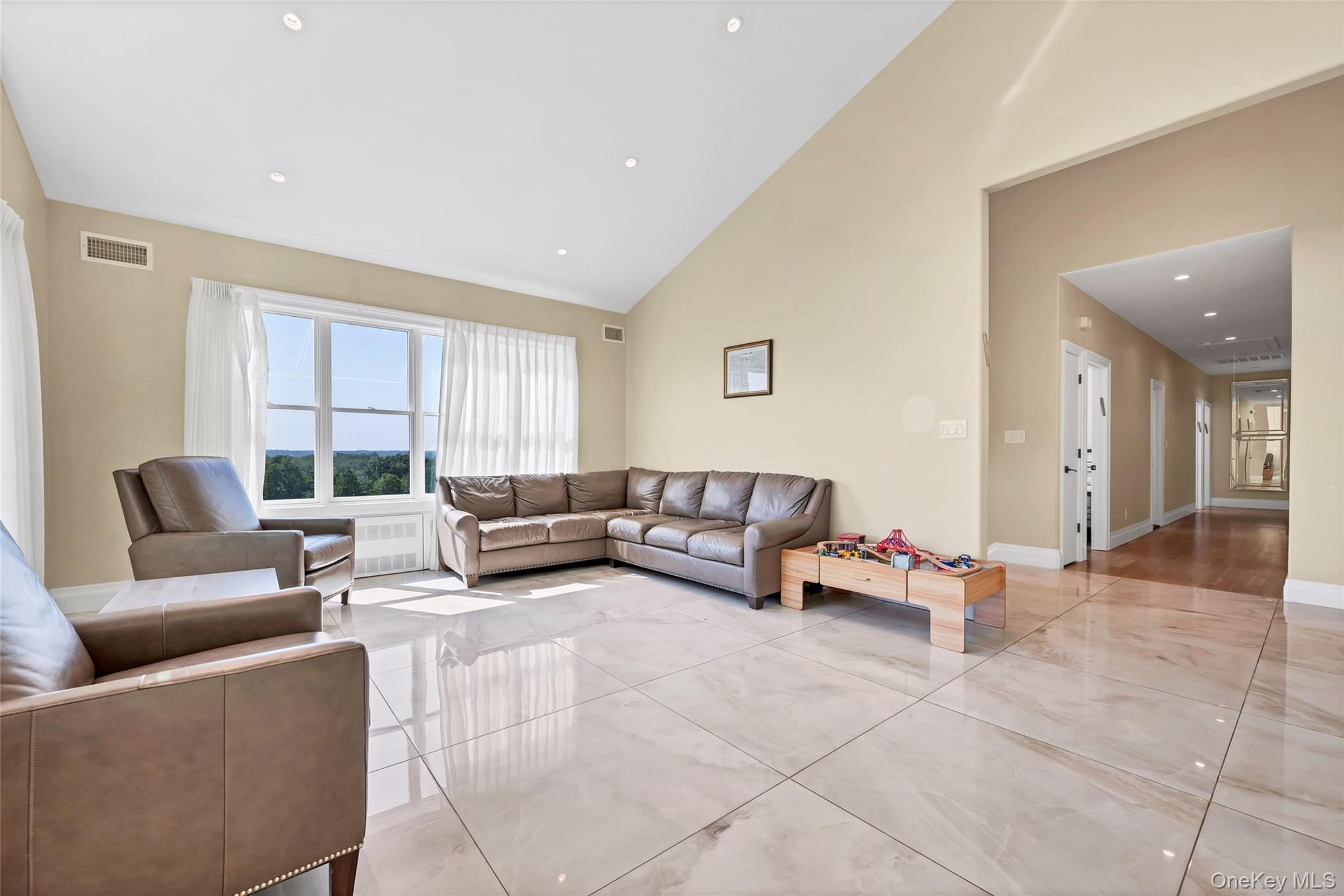 31 Walnut Ridge Lane Bloomingburg, NY 12721 - Photo 6 of 50 a living room with furniture and a large window