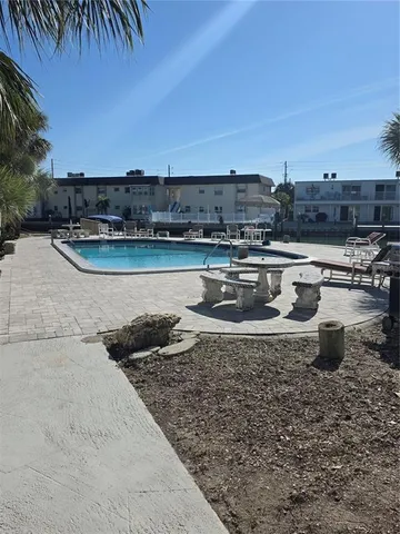 a view of a lake with a big yard