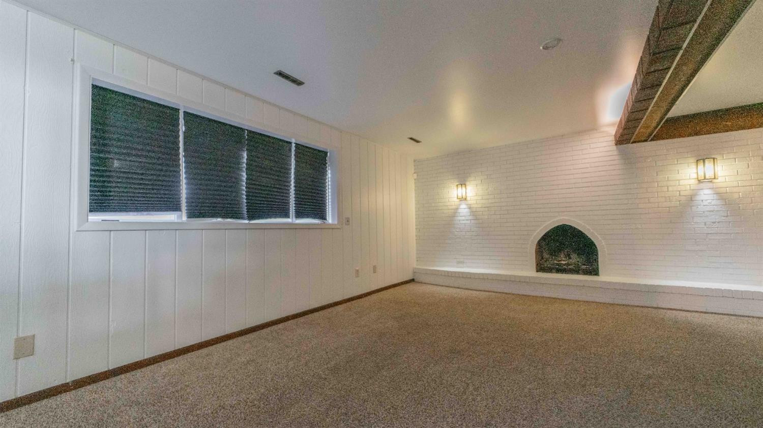 1925 Martha Street Munster, IN 46321 - Photo 11 of 23 a view of an empty room with a window