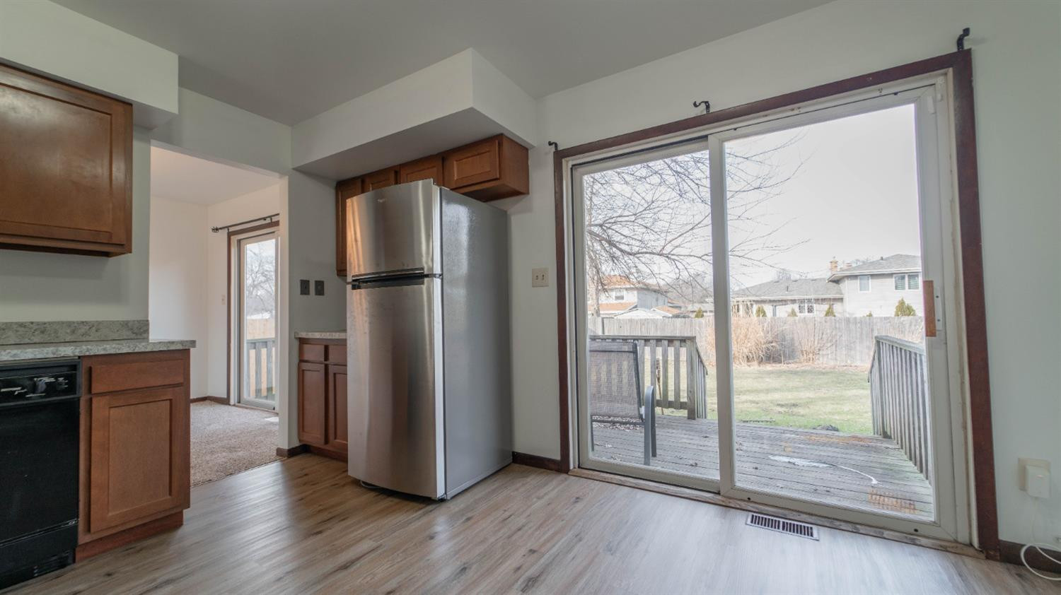 1925 Martha Street Munster, IN 46321 - Photo 6 of 23 a kitchen with stainless steel appliances granite countertop a refrigerator and a stove top oven