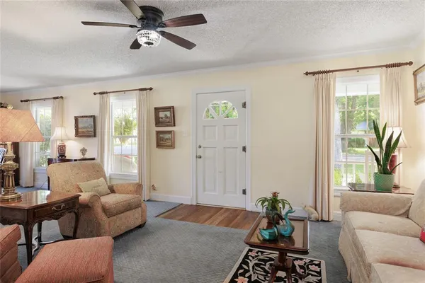 a living room with furniture and a window