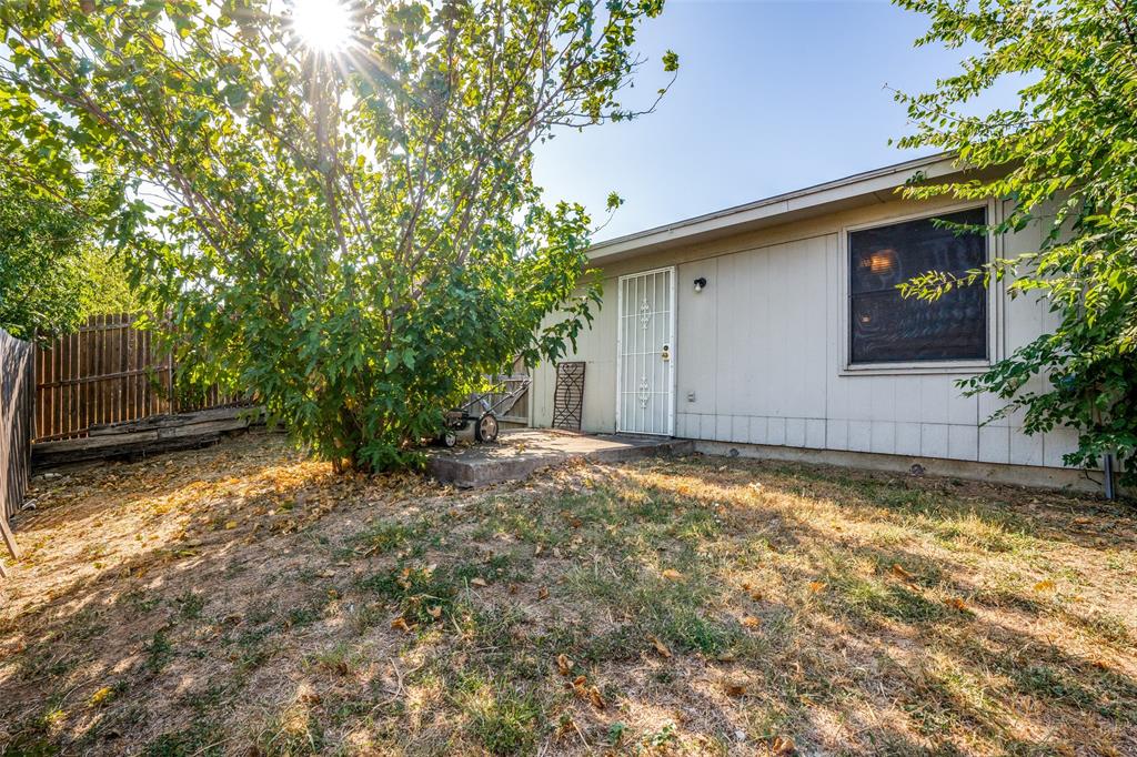 2820 Ridgecrest Drive Fort Worth, TX 76133 - Photo 25 of 25 View of yard with fence and a patio