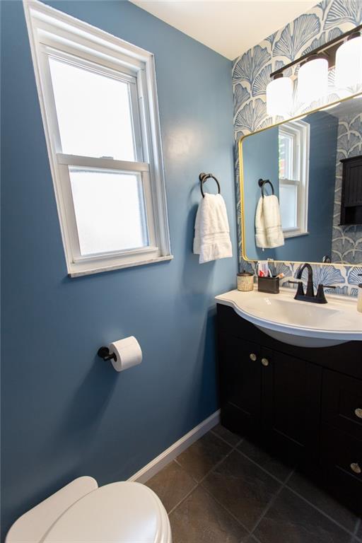 3211 Willett Road Pittsburgh, PA 15227 - Photo 11 of 27 a bathroom with a sink toilet and mirror