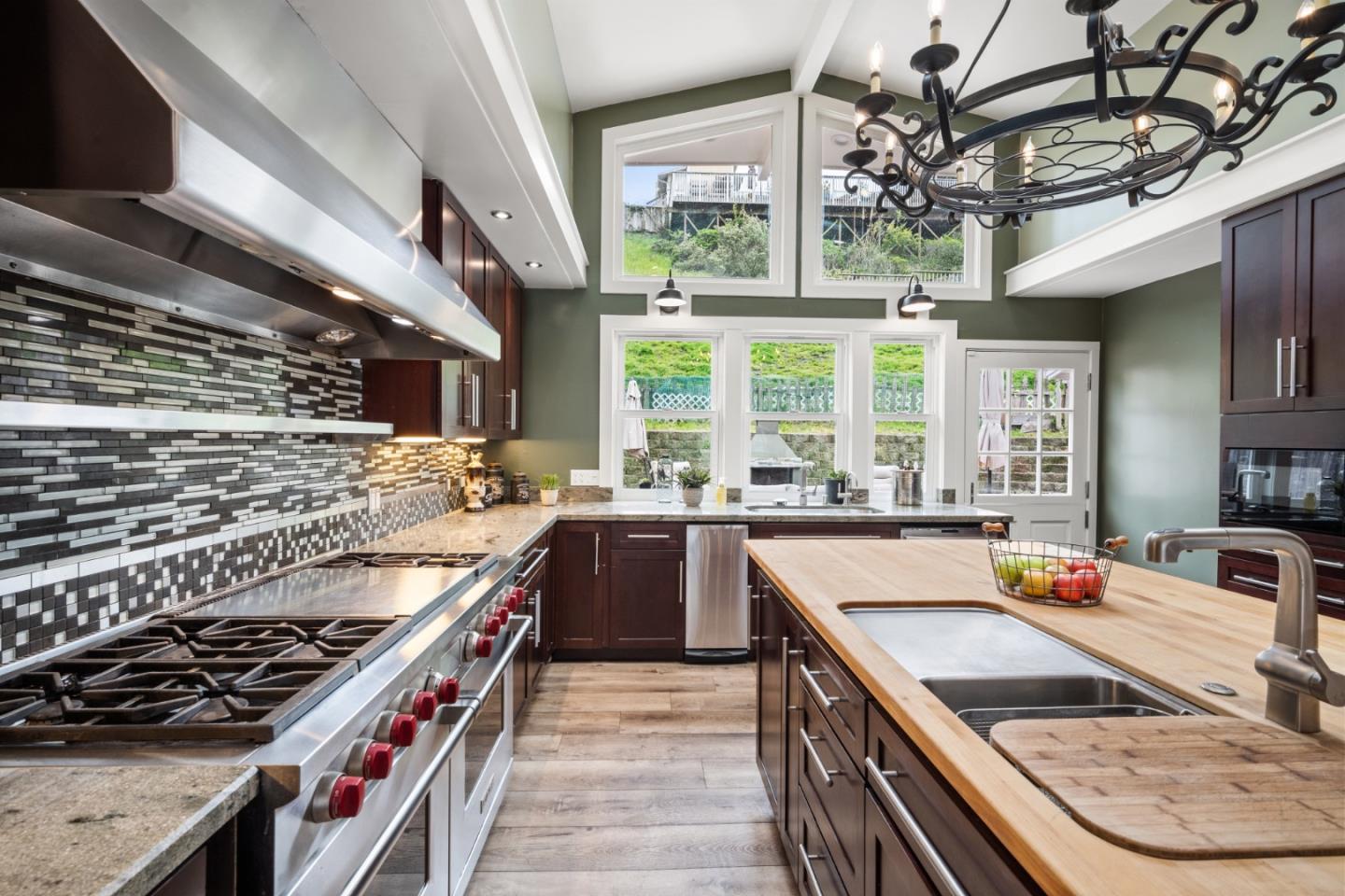970 Park Pacifica Avenue Pacifica, CA 94044 - Photo 19 of 61 a kitchen with a stove a sink and a refrigerator