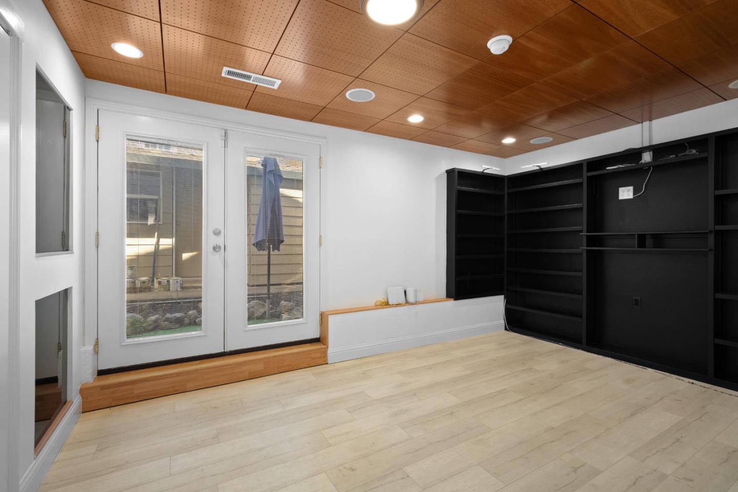 970 Park Pacifica Avenue Pacifica, CA 94044 - Photo 33 of 61 a bedroom with a bed and a walk in closet