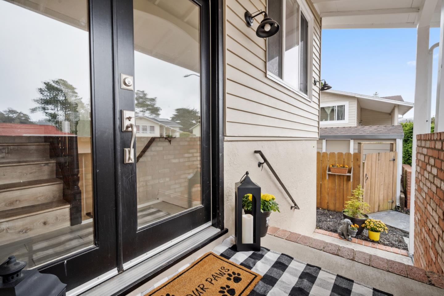 970 Park Pacifica Avenue Pacifica, CA 94044 - Photo 4 of 61 a view of a balcony with furniture and floor to ceiling window