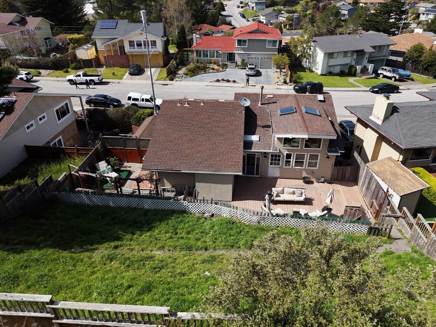 970 Park Pacifica Avenue Pacifica, CA 94044 - Photo 55 of 61 a aerial view of a house with garden