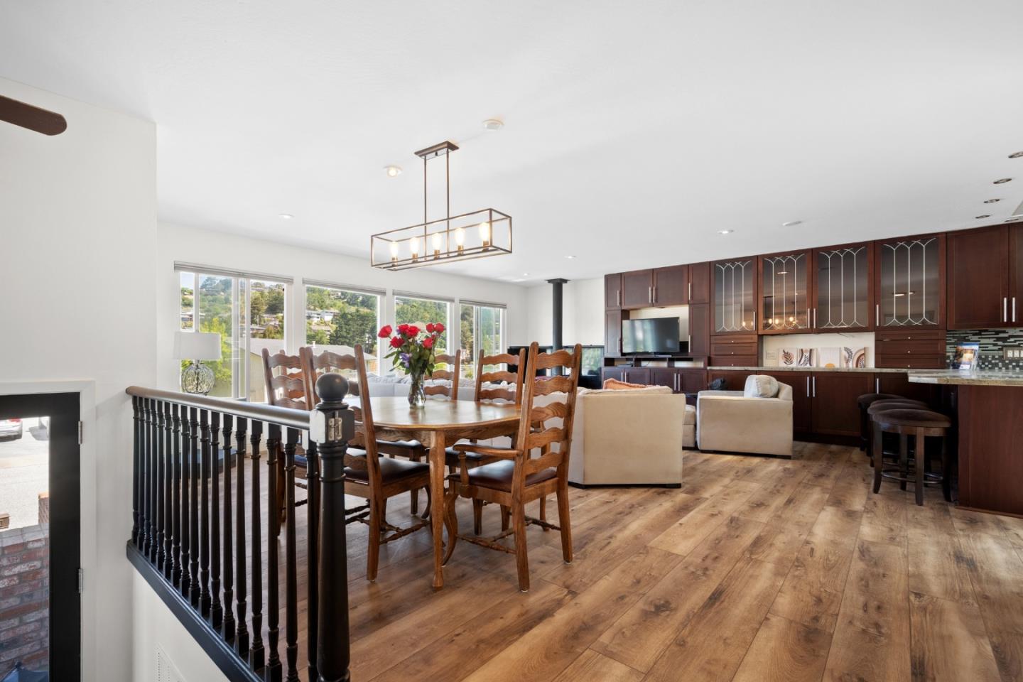 970 Park Pacifica Avenue Pacifica, CA 94044 - Photo 6 of 61 a living room with lots of furniture and kitchen view