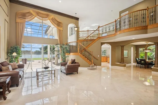 a very nice looking living room with a large window