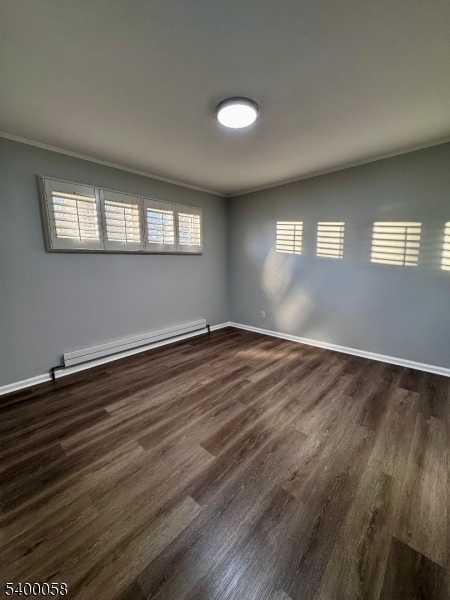 3 Fulper Place Clinton, NJ 08809 - Photo 19 of 49 an empty room with wooden floor and windows