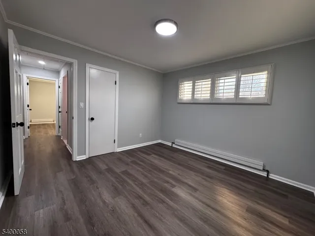 a view of a porch with furniture and a yard