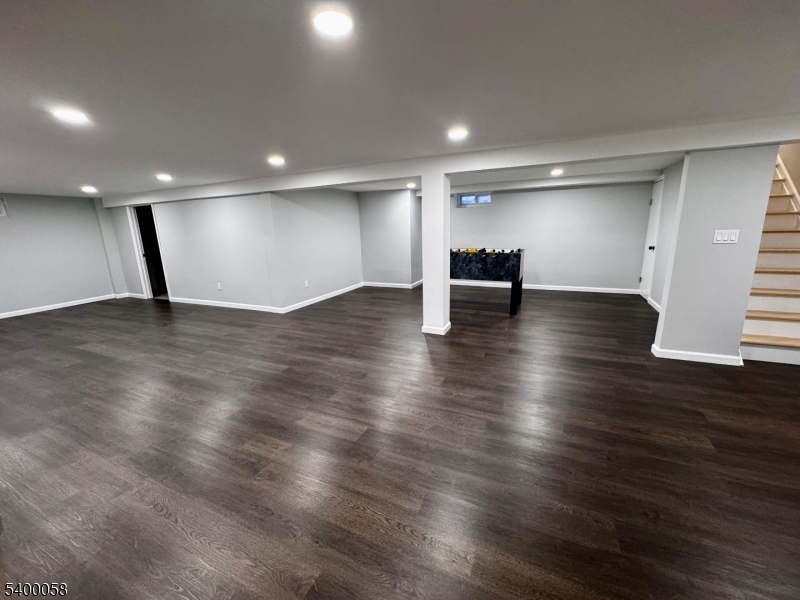 3 Fulper Place Clinton, NJ 08809 - Photo 31 of 49 an empty room with wooden floor and windows