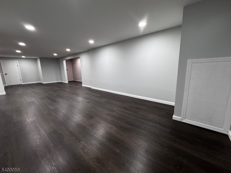 3 Fulper Place Clinton, NJ 08809 - Photo 32 of 49 an empty room with wooden floor and windows