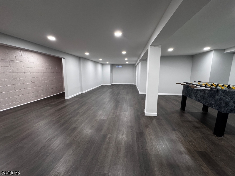 3 Fulper Place Clinton, NJ 08809 - Photo 33 of 49 a view of an empty room with wooden floor